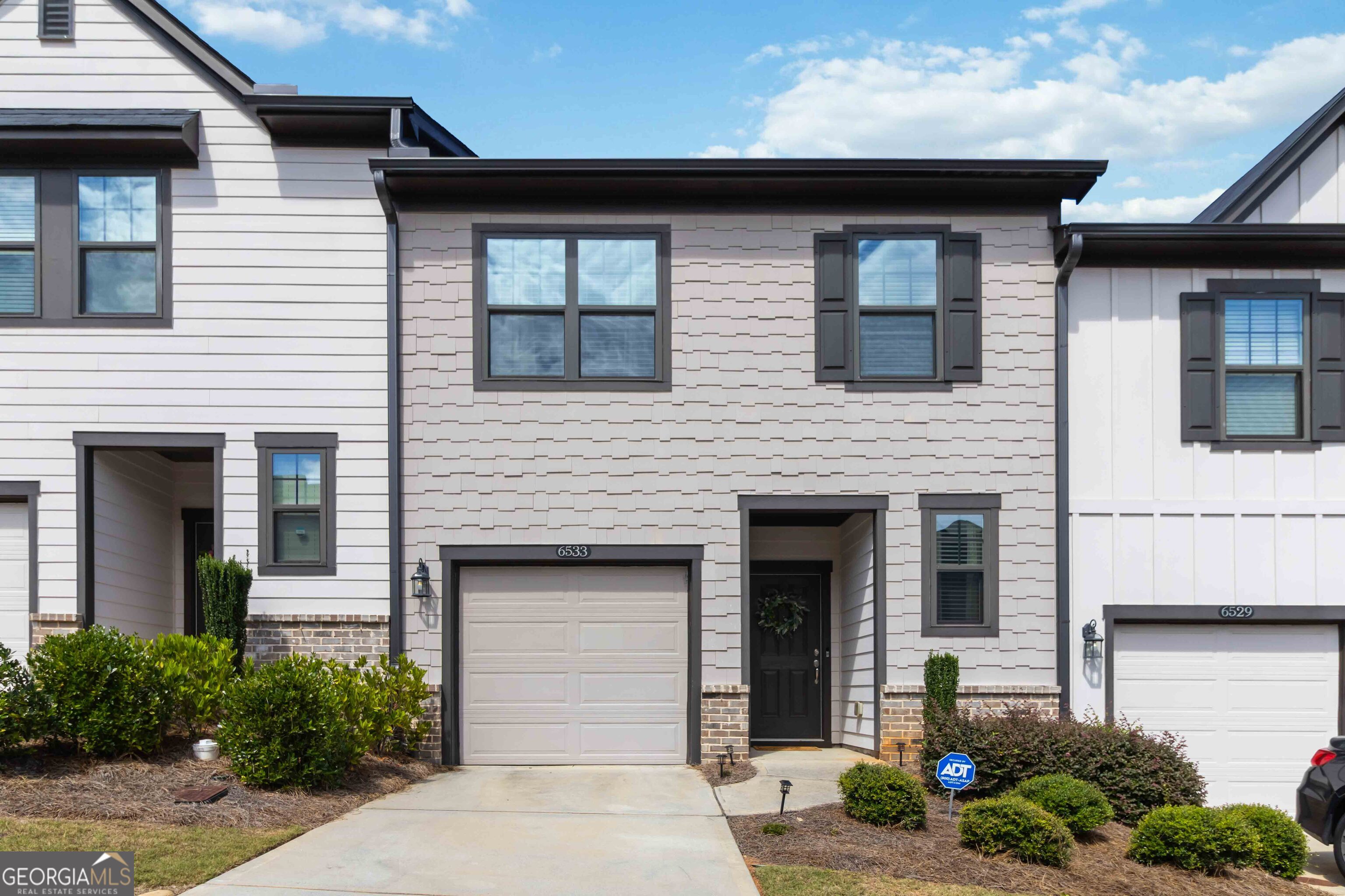 This newer townhome is bright, open, and filled with natural light. The kitchen is one of my favorite features-it has stainless steel appliances, 9-foot ceilings, espresso cabinets, granite countertops, a center island, and a big pantry, all overlooking the family room so you can still be part of the conversation while cooking. The breakfast area opens right out to a private back patio, perfect for relaxing or entertaining. There's also a half bath downstairs for guests. Upstairs, you'll love the spacious owner's suite with a walk-in closet and shower. The two additional bedrooms share a large full bath. Fresh paint throughout makes the whole space feel move-in ready. The community pool and cabana are just a short walk away, making it easy to enjoy sunny days right in the neighborhood. Location can't be beat-you're close to Truist Park, Smyrna Market Village, West Midtown, the Silver Comet Trail, and just minutes from Publix and more.