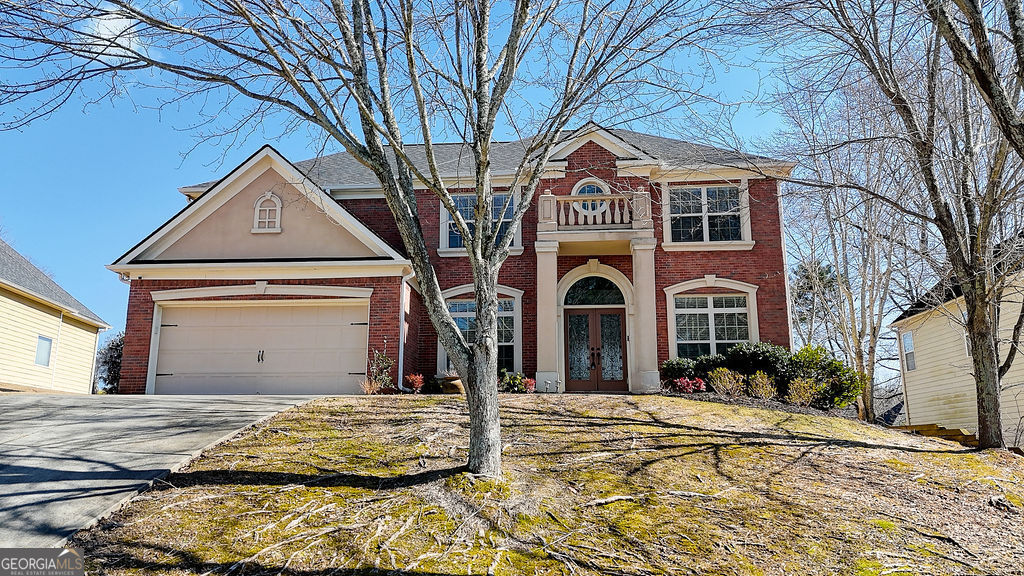 This stately and spacious 4-bedroom, 2.5-bath home offers unbeatable value inside the perimeter with no HOA and a long list of standout features. A brand-new HVAC unit has just been installed, and all appliances-including washer and dryer-will remain with the home. From the grand double-door entrance and hardwood floors to the oversized kitchen island with granite countertops and stainless steel appliances, this home delivers on both comfort and style. Upstairs, the large primary suite features a tray ceiling, sitting area, and a generous 4-piece ensuite bath with double vanities, separate tub and shower, and a walk-in closet. The second floor also includes three additional bedrooms, a full bath, and a separate laundry room. Step outside to enjoy an open backyard with two patios, including one covered-ideal for entertaining or relaxing. Back on the market after time off, the seller has completed a number of maintenance and improvement projects, addressing items that had previously been deferred to ensure the home is well-prepared for its next owner. The home is being sold as-is-not because of any concerns, but because it's truly move-in ready. The driveway does have a slope, but with the right angle and a little care, it's no issue at all. Conveniently located near parks, shopping, golf, major highways, and just minutes from downtown and the airport. A home warranty are available with an accepted offer. Priced to sell-schedule your showing today!