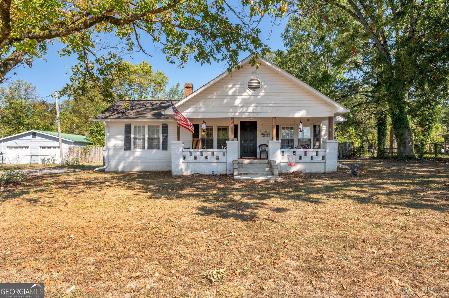 Calling INVESTORS or future homeowners who want to add their own touch!!! Character galore! From the rocking chair front porch to the original hardwood floors, this house boasts many touches from days gone by! Sellers have made some updates during their ownership. The center of this house is the spacious kitchen which you enter from the front living room and pass through to get to the family room. There are 3 spacious bedrooms that have enough distance between them to offer privacy. The main bedroom has a 1/2 bath for added privacy. The kitchen is large and will allow for many cooks at the same time. This home is being offered ''AS IS''. REMEMBER, original structure was built in 1932 and there are repairs needed, which Sellers are unable to make. THANK YOU!!!