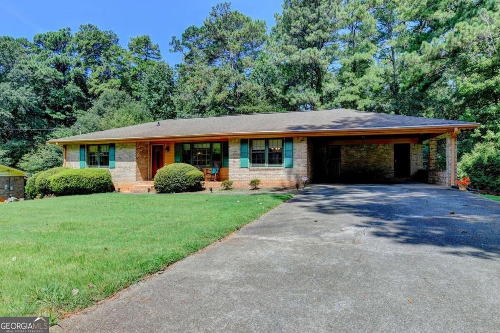 Photo of 4061 Whispering Forest Court SW, Lilburn, GA 30047 (MLS # 10872228)