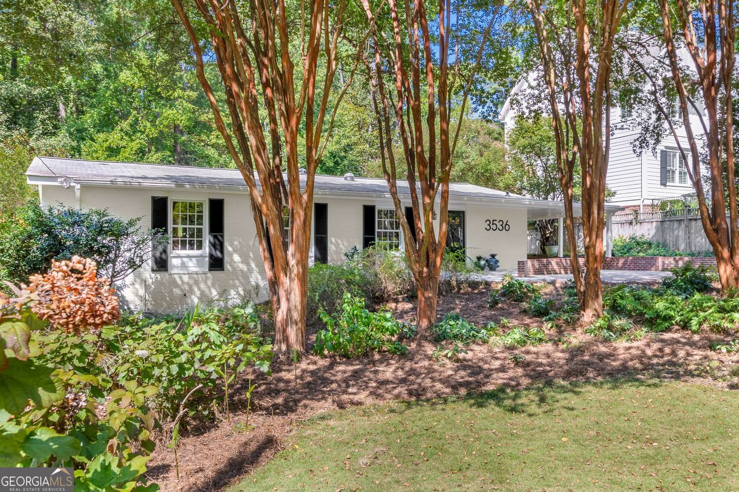 Welcome Home to this highly desirable Sexton Woods-Keswick Village neighborhood in Chamblee! This charming home offers comfort, lush green spaces & privacy along with all the conveniences of modern, city life. Surrounded by mature trees & greenery, you will be steps away to Keswick Park's dog park, playground, soccer fields, tennis courts, a community building and so much more. Enjoy the nearby community walking & biking trails taking you to a wide variety of shops & restaurants; walk to highly rated schools. Inside the I-285 perimeter highway, this home offers easy access to Buckhead, Brookhaven, Chamblee, Dunwoody, Sandy Springs, Children's Healthcare of Atlanta along with the medical facilities of Emory St Joseph's and Northside; educational institutions of higher education are just a short drive away. This home offers the perfect blend of peaceful privacy & modern living. A canopy of trees & perennial plants welcomes you at the front, offering a pleasant spot to relax with your morning coffee or an evening drink. Out back, entertain on your spacious new deck overlooking the secluded woods surrounded by nature. Inside, enjoy the fresh paint throughout, the spacious living and entertainment areas as well as the updated kitchen and bathrooms. Don't miss this opportunity to live in this unbeatable location! Welcome Home!