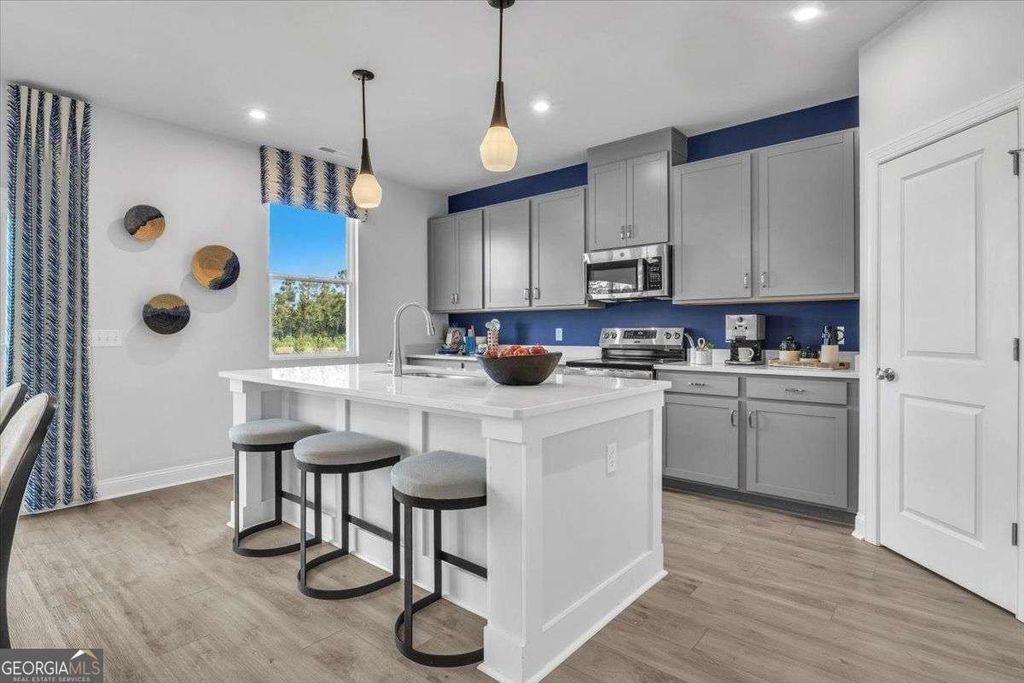 Photo of 75 Hickory Grove Avenue, Lawrenceville, GA 30046 (MLS # 10715654)