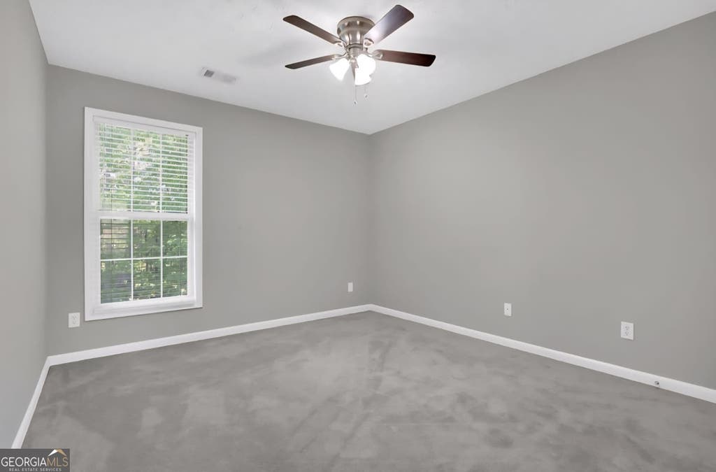 Photo of 1403 Elderberry Run Cove, Lawrenceville, GA 30043 (MLS # 10809493)