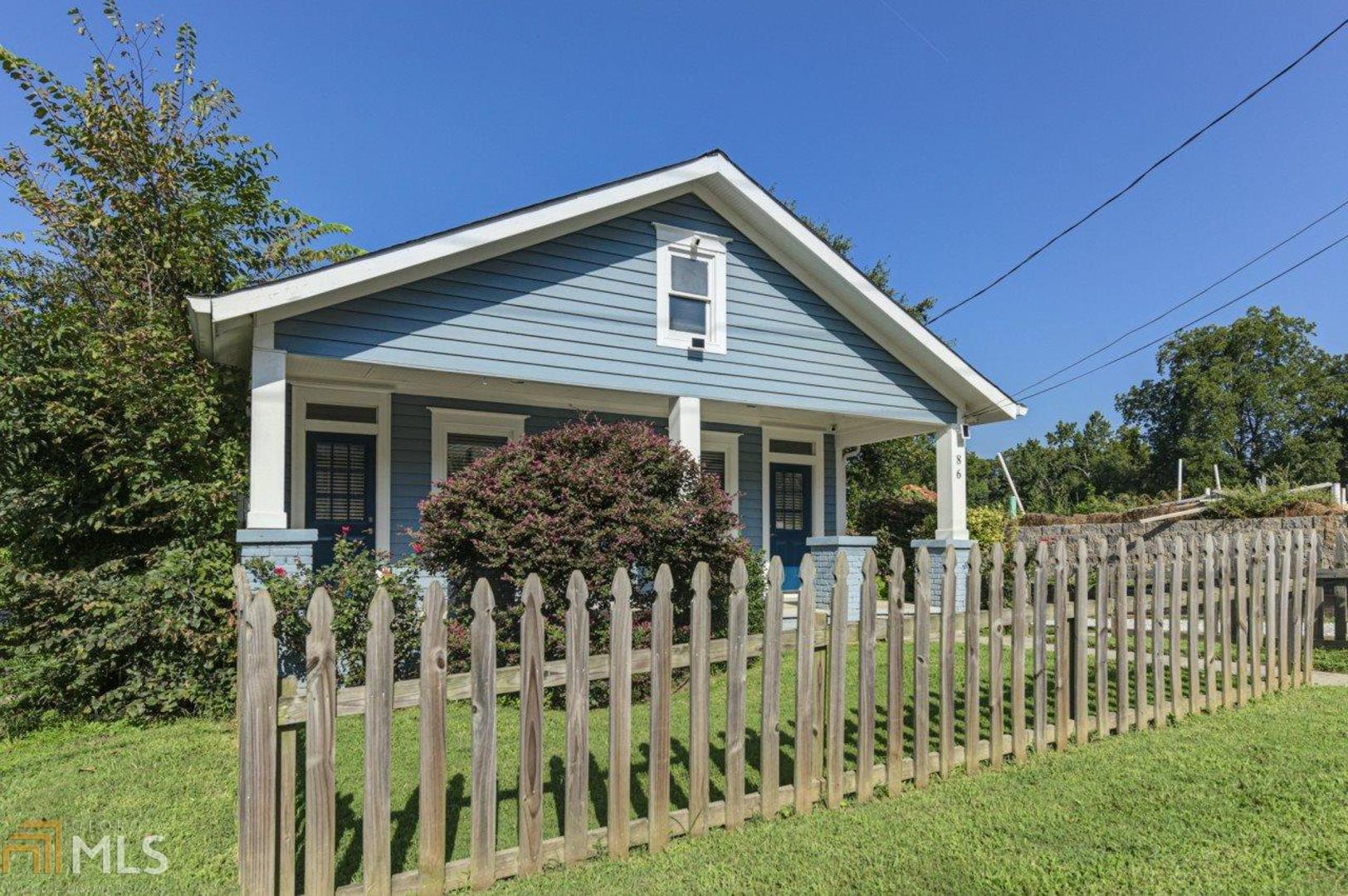 Fully Renovated in Edgewood! New Paint, New Carpet, and New Fixtures make this home entirely move-in ready! From a Picket-Fenced Front Yard and Oversized, Covered Front Porch, step in to find a Family Room with beautiful hardwood floors, a Dining Room, Flex Space, and Kitchen. The self-proclaimed chef will love cooking in this kitchen with Stainless Steel Appliances, Granite Counters, and a delightful window over the sink. Charm is not lost in this home with several fireplaces throughout! The Master Bedroom features Two Walk-in Closets, and a Spa-like Bath with a Dual Vanity, Large Standing Shower, and Soaking Tub. Enjoy entertaining friends and family (when time permits, of course) on the Back Deck overlooking a Flat, No Maintenance required, Fully Fenced Backyard. There's even a Smart Thermostat and Invisible Dog Fence already installed! You'll love the premium location only a stone's throw from a Community Garden along with being extremely close to the BeltLine and the Edgewood Shopping Center with a Kroger, Target, and Lowes - all with easy access to I-20. Come join the wonderful Edgewood Community! You'll love it here!