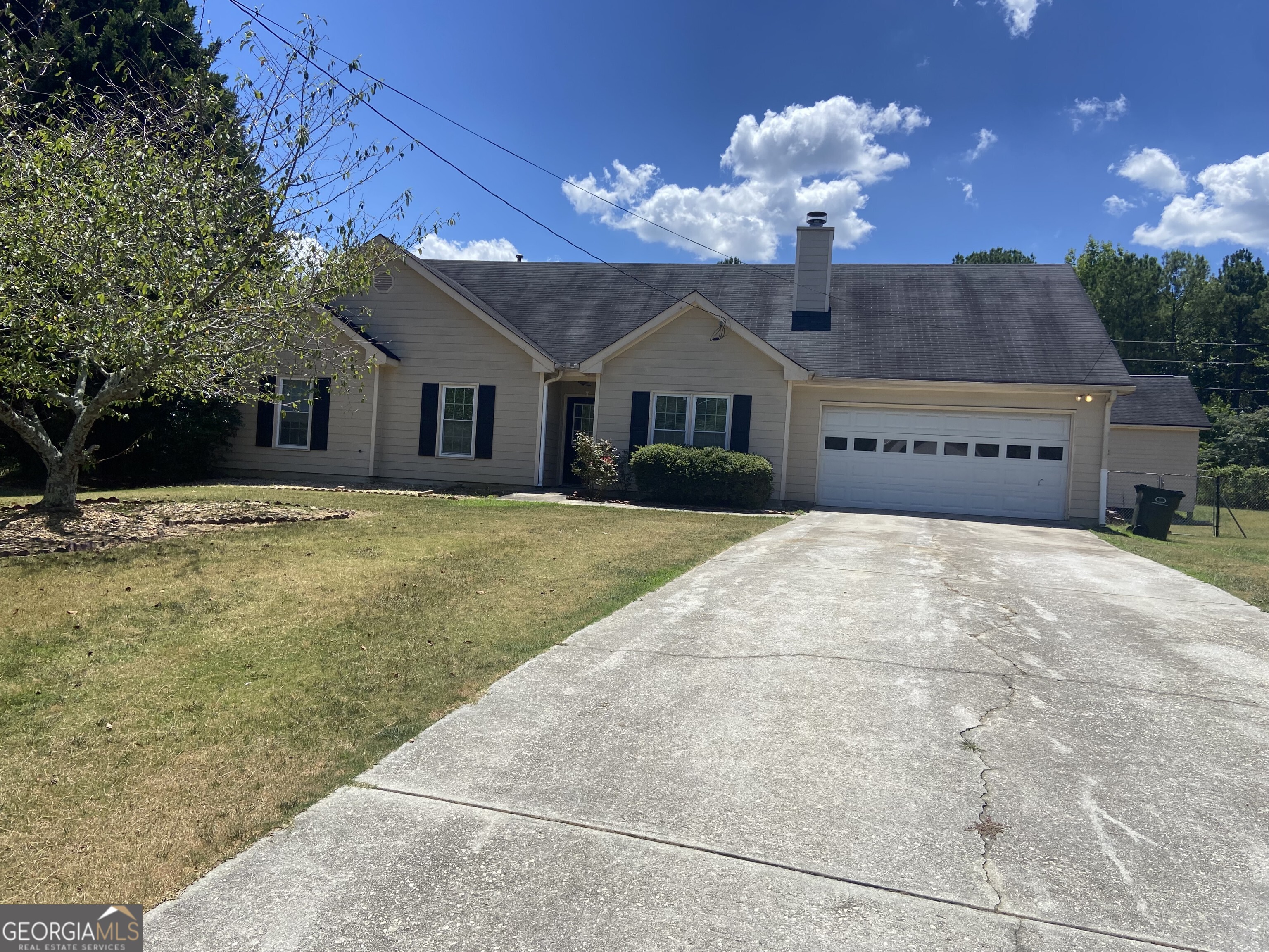 Fantastic Opportunity - Ranch Home on Nearly 1 Acre in Cul-de-Sac! Don't miss this great opportunity to own a charming ranch-style home situated on a spacious, level lot just under one acre at the end of a quiet cul-de-sac. With a little TLC, this home has amazing potential! Features include vaulted ceilings and abundant natural light, new HardiePlank siding, new windows, and a recent HVAC system for peace of mind. The property also includes a 20x25 outbuilding fully permitted by the county with electricity and drywall already in place. Perfect for use as a guest house, workshop, art studio, or she shed! This home mostly needs cosmetic updates, making it an excellent opportunity for homeowners or investors to add value. Great buy in a desirable location schedule your showing today!