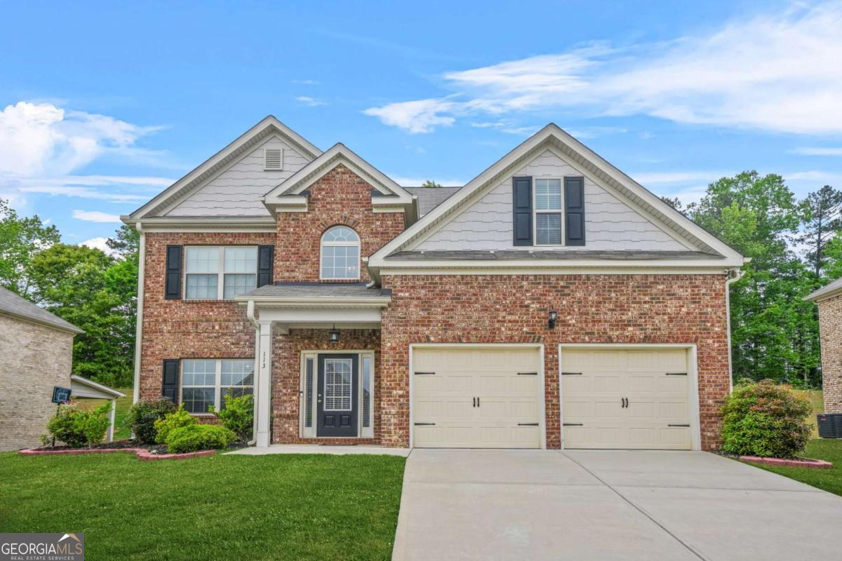 Welcome to luxury and contemporary living at its finest! This stunning 4-sided brick home offers 4 bedrooms, 2.5 baths, and a 2-car garage, combining elegance, space, and functionality. The oversized master suite is a true retreat, featuring a large spa-like bath with beautiful tile work, a soaking tub, a separate shower, and an impressive walk-in closet. The secondary bedrooms are all great sizes too. The formal dining room showcases a sophisticated coffered ceiling, adding charm and character to your gatherings. The heart of the home is the large kitchen, complete with granite countertops and stainless steel appliances Co perfect for the cook or chef of the family to create and entertain in style. Enjoy the spacious open family room with a fireplace designed for entertaining guests or relaxing with family. Every corner of this home is designed with style, comfort, and practicality in mind. This home is in Henry County School District.