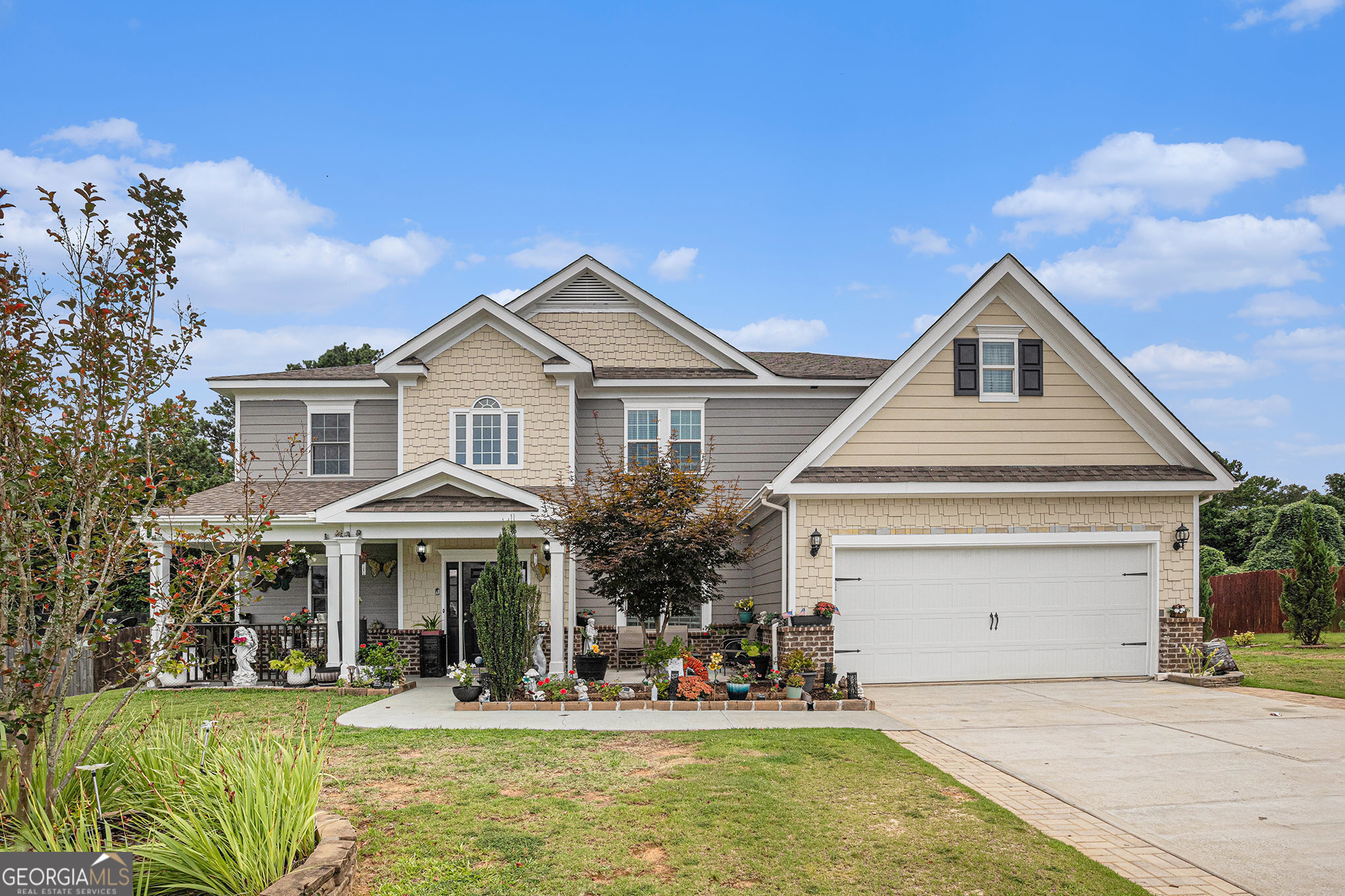 Welcome to this exquisite custom-built 6-bedroom, 4-bath home in the highly sought-after Sutherland community! This impeccably maintained residence offers the perfect blend of elegance, comfort, and convenience-featuring countless upgrades throughout. Located just minutes from Chimneys Golf Course, Fort Yargo State Park, local parks, downtown Winder, and Hwy 316, this home provides easy access to recreation, shopping, and dining. Step inside to an inviting open floor plan adorned with custom tile and marble in the foyer. The two-story grand great room impresses with coffered ceilings, rich crown molding, and an abundance of natural light. The main level features two bedrooms and a full bath with a step-in shower-perfect for guests or multigenerational living. The spacious kitchen is an entertainer's dream, showcasing granite countertops, custom trim, LVP flooring, and a massive island overlooking the family room. Upstairs, unwind in the oversized owner's suite complete with a cozy sitting area, shiplap accents, LVP flooring, and a spa-inspired en suite with custom tilework, soaking tub, double granite vanity, and a large walk-in closet. Three additional bedrooms and two full baths complete the upper level. Set on a large, level, fenced-in lot, with a storage shed/workshop, this backyard is a private retreat with the beginnings of an outdoor kitchen-ready for your personal touch! Don't miss this rare opportunity to own a beautifully upgraded custom home in a PRIME location. Schedule your showing today!