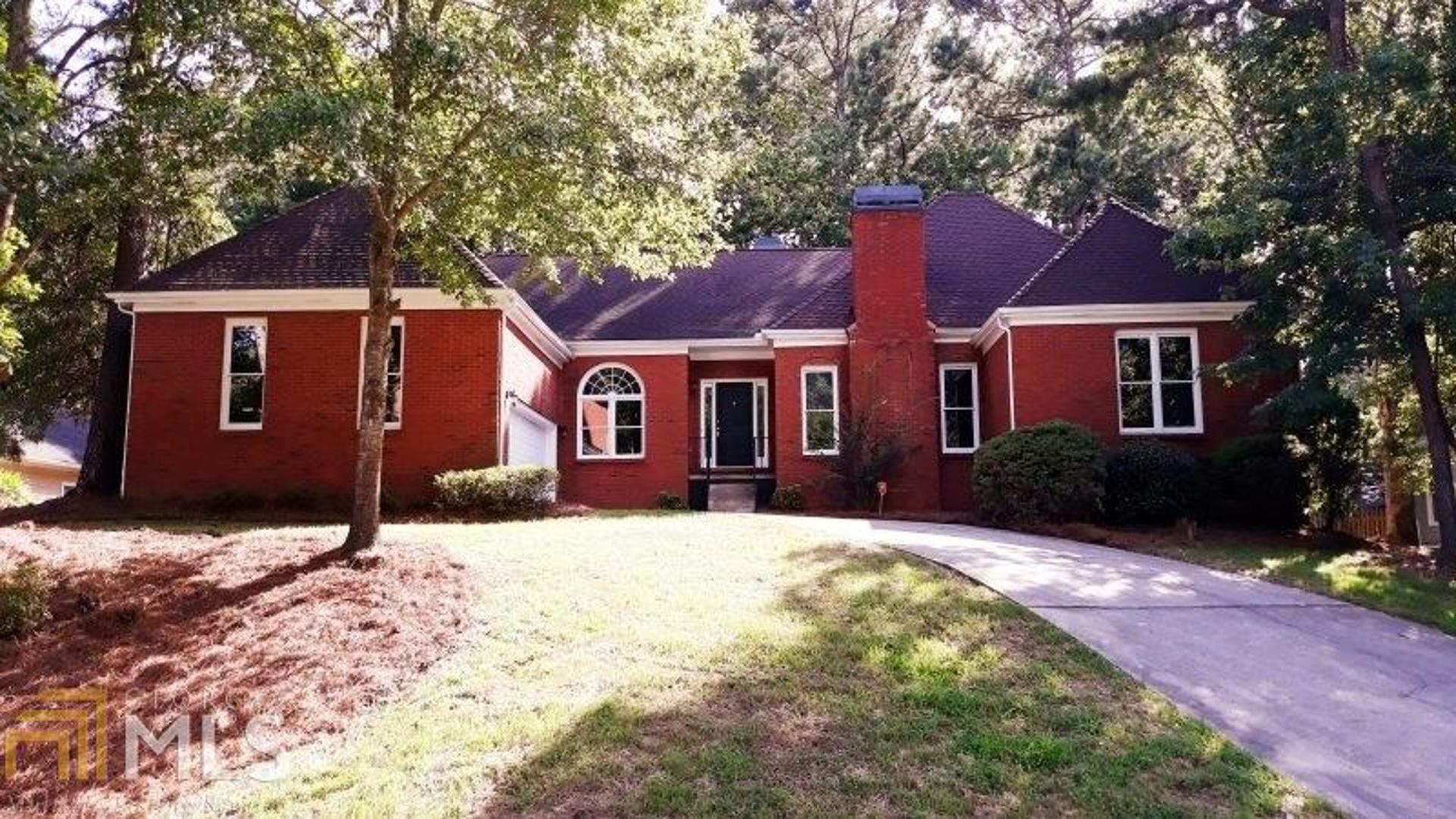 This beautiful 3Br-2.5Bth ranch home is nestled in a wonderful and family friendly Snellville community. This recently renovated home boasts lovely high ceiling with upgraded crown molding complimenting the vaulted ceiling throughout. This spacious ranch floor plan is great for friendly gathering featuring separate living and dining rooms with two fireplaces and gorgeous Formal dinning room. Stunning gourmet style kitchen features tons of cabinet space, stainless steel appliance, subway tile back splashes, granite counter tops and a eat in kitchen area overlooking a stunning open floor plan. Master Oversized bedroom features a full walk in closet and two separate additional closet areas, updated master bathroom with soaking tub and separate shower