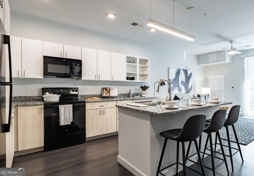 Beautiful Resort-Style Pool with Sun-Shelf Entry. Comfortable Loungers and Shaded Seating. Serene Setting Surrounded by Landscaped Grounds. Fitness Studio with Cardio and Strength Training Equipment. Free Weights and Yoga Mats. Lounge Areas with Cozy Seating, Community Library and Board Games, and Billiards Room.