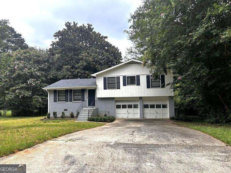 Welcome to 120 Mossy Brook Drive in Stockbridge! This charming split-level home offers a spacious layout filled with natural light throughout. Enjoy a large, open kitchen featuring abundant cabinet space-perfect for cooking and entertaining. The dining room opens to a private deck, ideal for outdoor dining or relaxing while overlooking the serene, private backyard. Generously sized bedrooms and living areas provide comfort and flexibility. Don't miss this opportunity to own this home! Check it out today!