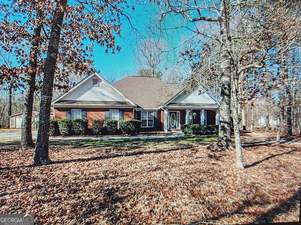 Photo of 12697 Simmons Road, Hampton, GA 30228 (MLS # 10812863)