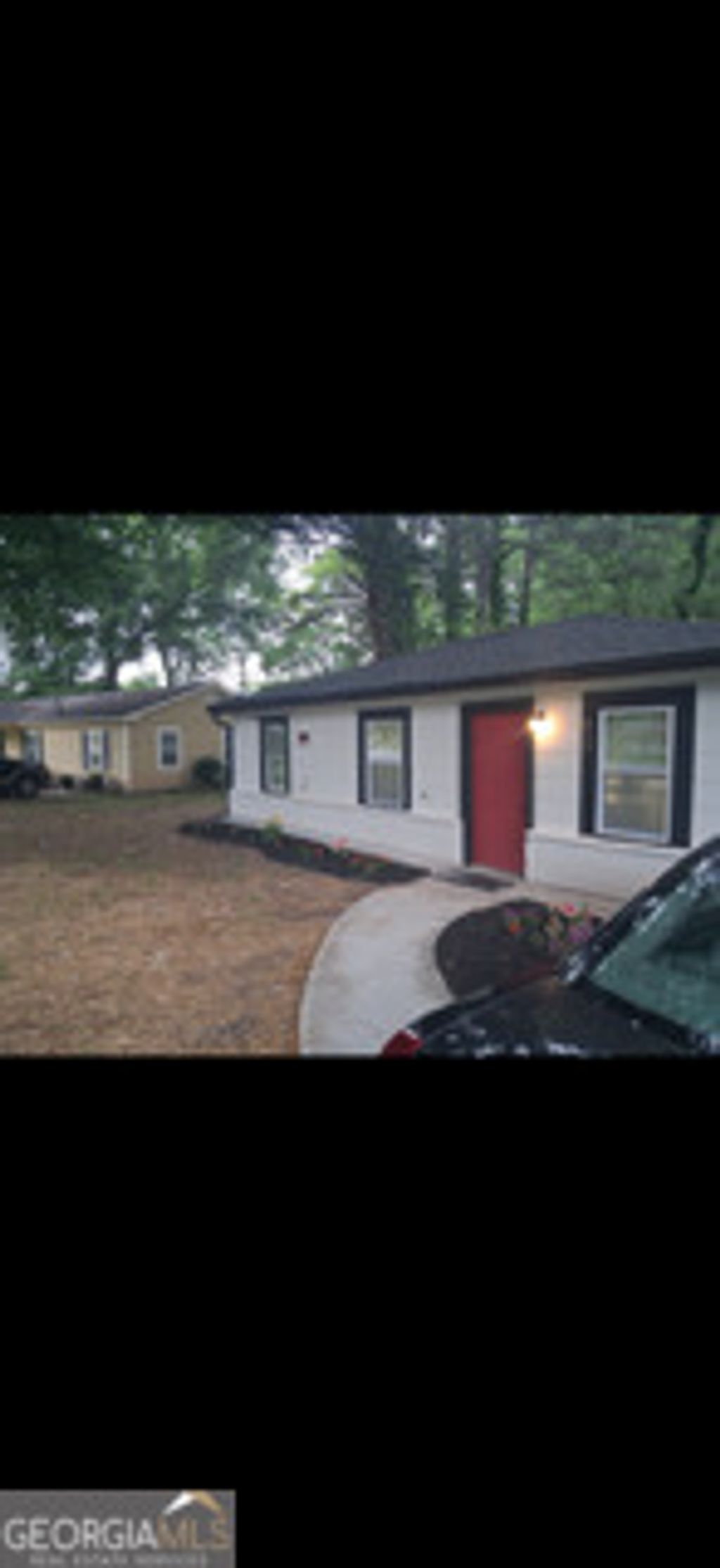 Photo of 817 Ayrshire Circle NW, Atlanta, GA 30318 (MLS # 10763392)