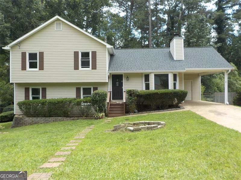 Move-in Ready, Renovated House, recently New HVAC system and thermostat , windows installed few years ago, recent new Roof, Water heater ,and new front and beautiful back porch built . Bathrooms fully renovated with beautiful marble style tile, showers with elegant frameless glass doors. Cozy Stone fireplace in living room. Located on a large level lot, established community with NO HOA , no restrictions. Quick easy access to GA 317 and I-85, only minutes to Georgia Gwinnett College, Mall of Georgia and many shops and restaurants.