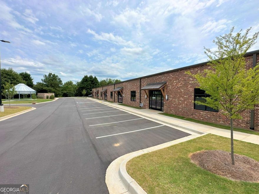 Rare Opportunity: Available Warehouse/Office Space in the otherwise completely leased up Silo Park at Colony Square in Watkinsville, GA. Unit 503 is a 760 sqft heated and cooled space and includes 1 bathroom, 1 office and showroom space. Remaining 1640 sqft is warehouse space with 12x14 roll up door. Silo Park is located within the already established mixed-use Colony Square Planned Development that includes retail as well as office/warehouse space in Watkinsville, GA in Oconee County in the Athens, Ga Regional Area. Retail area includes multiple gyms, Joe and Sam's Cafe, Rachels Restaurant, and more (all walking distance from this unit). Silo Park includes an outdoor silo-style pavilion with new picnic tables and lawn gathering spaces for office cook-outs or to just get out of doors at lunch or work in the fresh air. The location is unbeatable on every level. Close to schools, retail, restaurants and cafes for lunch, and quick access to Athens, GA (home of UGA), major highways to Atlanta as well as North-South/East-West Interstates. Oconee County is one of the top school districts in the state and all the schools are incredibly close to Silo Park to get you to/from the ball games so fast that you wont have to leave work an hour early to immerse yourself in the biggest reason why you work so hard: Family. Don't compromise on location. Join us for a truly life changing move. Zoned OBP. For all permitted uses and more information, please visit www.thesilopark.com or call listing broker for more details. NO AUTOMOTIVE SHOPS/BODY SHOPS/DETAILERS/CAR WRAPS, ETC. Owners are Georgia real estate license holders.