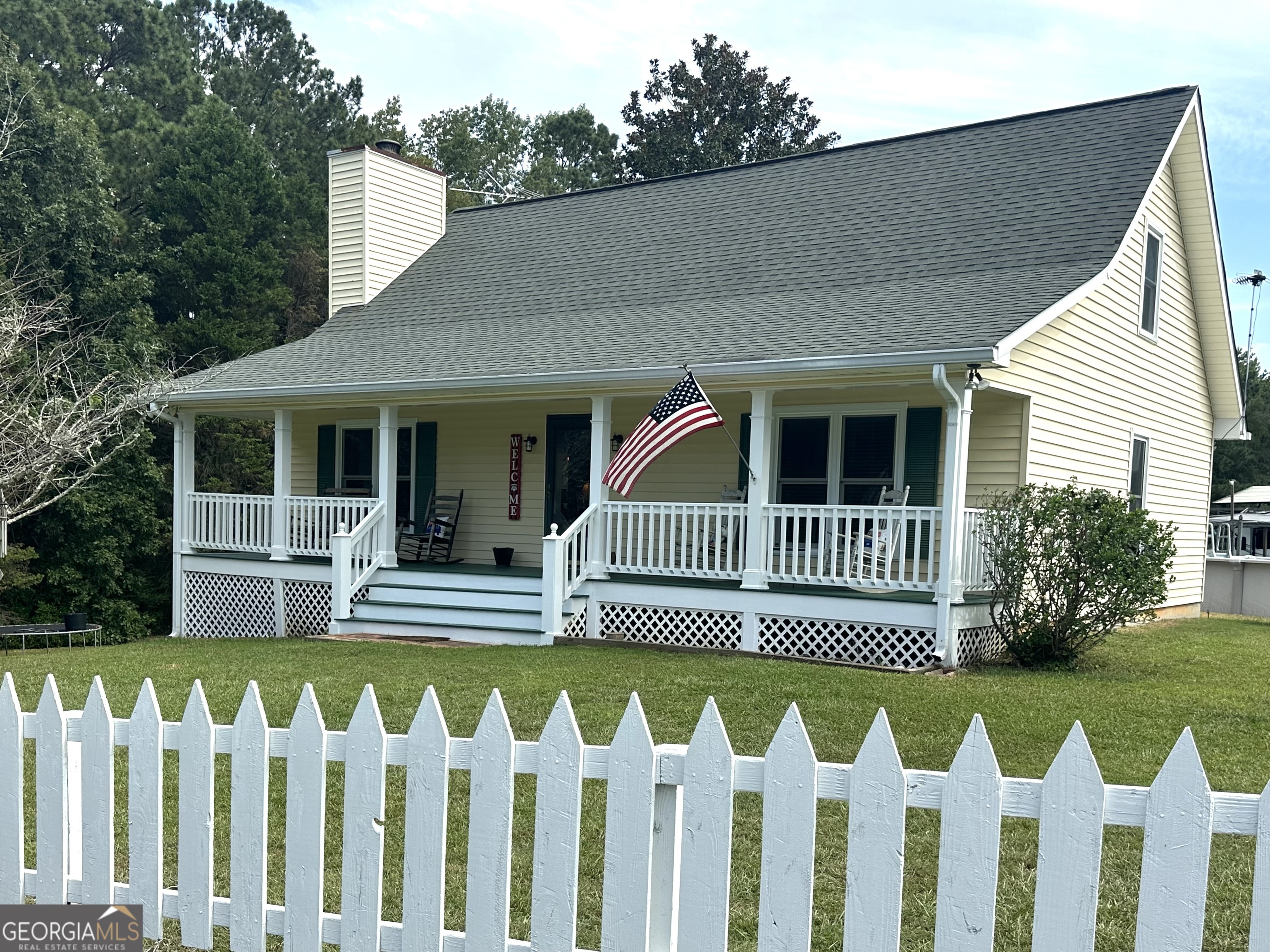 This fabulous home situated on a sprawling 18.82 acre plot located just outside Historic Senoia GA will make the perfect homestead for you and your family. With large spacious floor plan; master on the main, two bedrooms up stairs and bedroom area or in law suite in the basement offering ample room for family and guest. Tile floors throughout most of the home with brand new LVP flooring upstairs. You will love having your coffee on these cool mornings relaxing on the front porch or deck overlooking the pastures with families of deer and other wildlife roaming the fields. Plenty of room in the pastures for horses or cattle. This home can make a picturesque homestead. Grow your own healthy food, the garden area is already fenced. Let the children run and play outside, ride ATV's just let them be kids. The basement is mostly finished out and includeds a full bath with additional rooms painted which can easily be used as workout room, extra bedroom , wine cellar ect. Located approximatley one hour from Hartsfield Jackson International Airport this estate offers a perfect set up for a peaceful private home yet within easy access to Senoia, Shopping and the airport. Text Gene Reynolds 770.315.5731 for a personal tour. By the way having 18.82 acres the property can be in a Conservation Use Program as a farm which offers lower property tax rate. Ask Gene to find out more. Come see this gorgeous home call Gene