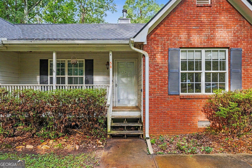 Photo of 58 S Singley Drive, Locust Grove, GA 30248 (MLS # 10852278)
