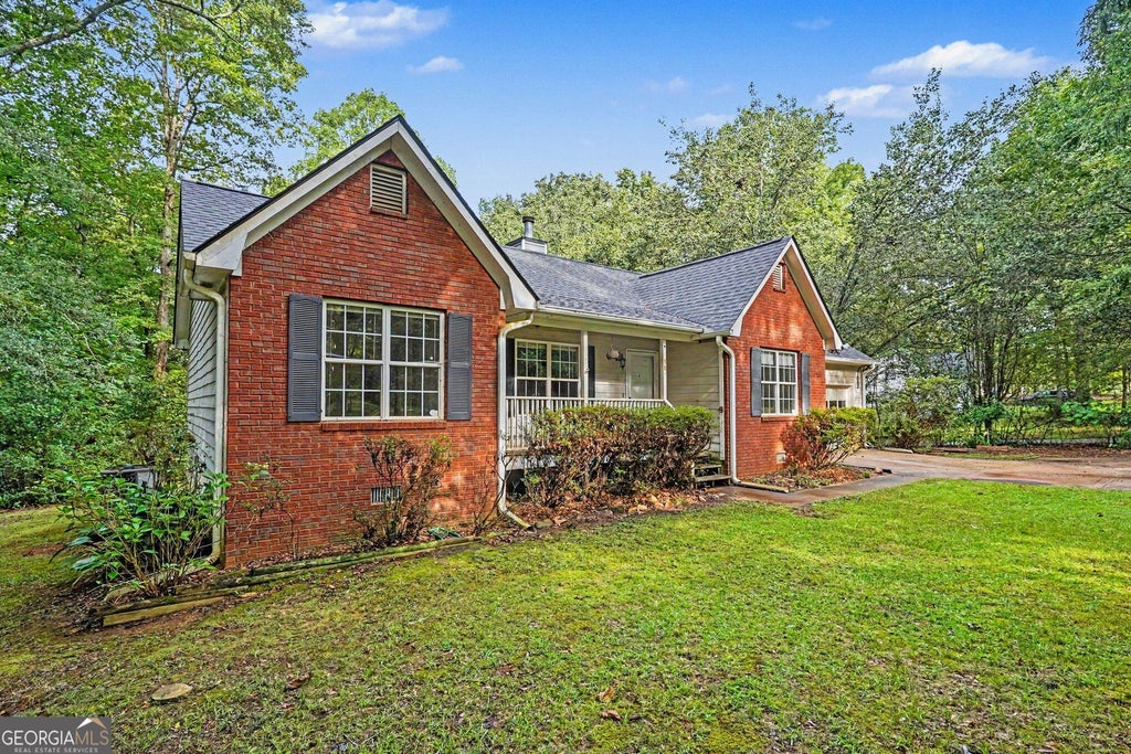 Photo of 58 S Singley Drive, Locust Grove, GA 30248 (MLS # 10852278)