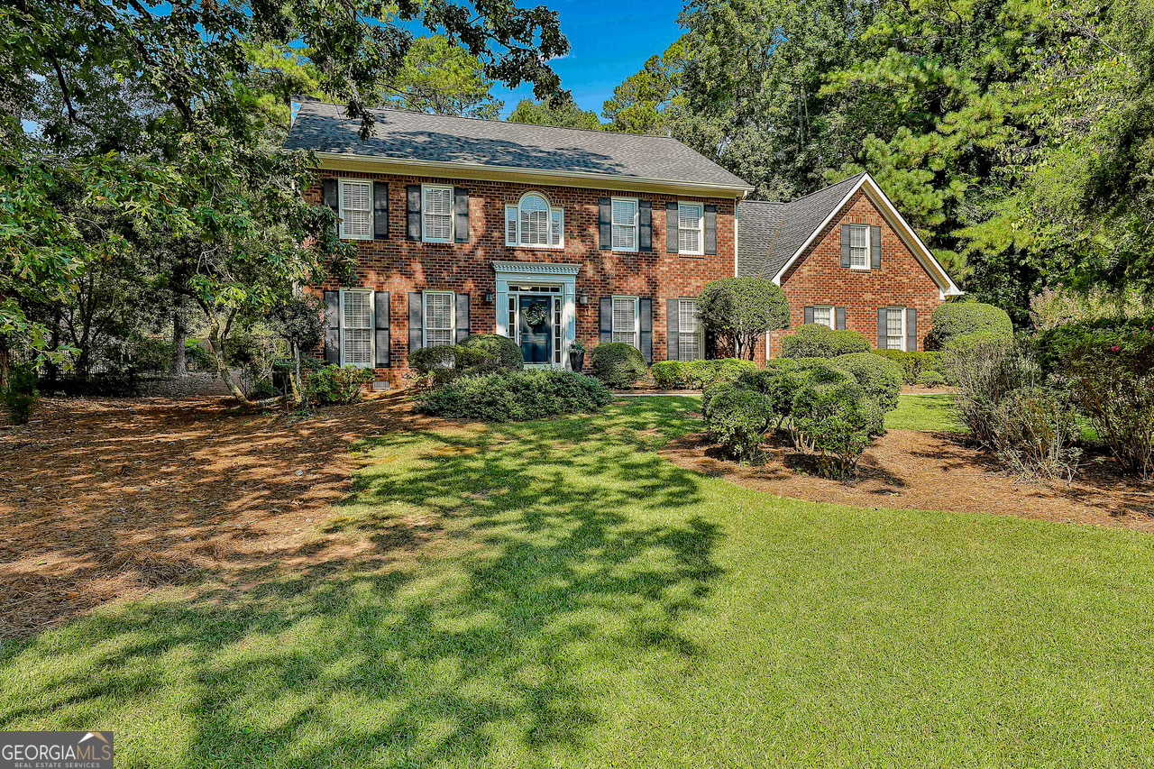 Prime Central Peachtree City Location! A RARE OPPORTUNITY to own in the highly sought-after THE SUMMIT neighborhood, just steps from golf cart paths that connect you to award-winning schools, shopping, dining, parks, The Fred Ampitheatre and Lake Peachtree - all right in the HEART of Peachtree City. This lovingly maintained home has been thoughtfully remodeled to create an open flow between the Family Room, Kitchen, and Formal Dining Room. Beautiful HARDWOOD FLOORS shine throughout BOTH LEVELS, adding warmth and character. This beautifully updated home offers a flexible main level with a formal living room/office/playroom, an eat-in kitchen with purified drinking water system, a spacious dining room, and a family room with custom fireplace and crown moulding. Upstairs, two staircases lead you to a generous Owner's Suite with a RENOVATED spa-style bathroom, soaking tub, dual vanities with extra storage, and a private shower room. Three additional bedrooms share a full bath, plus a LARGE BONUS ROOM that can serve as an exercise room, playroom, office, or even a fifth bedroom. Conveniently, the laundry is also upstairs. Step outside to enjoy your private backyard with a brand-new deck (2025) and PERFECT FOR A POOL . Major updates include a NEW ROOF (2025), two NEW HVAC systems, encapsulated crawl space, and a floored/illuminated attic for extra storage. With parks and playgrounds just steps away and miles of golf cart paths connecting you to everyday conveniences, this home offers the perfect blend of comfort, updates, and an unbeatable location!