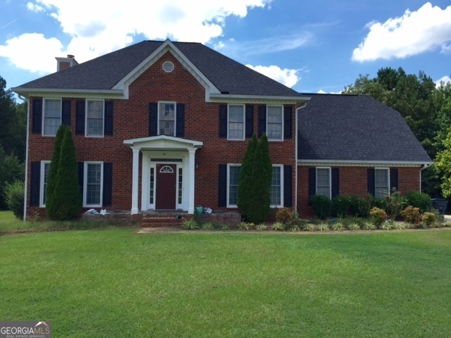 A spacious home located in the town of Fayetteville, GA. This recently renovated home offers a blend of comfort and modern living. The home features a two-car garage, a cozy fireplace, and a pantry for extra storage. The breakfast room is perfect for casual dining, while the separate dining room is ideal for more formal occasions. The kitchen is equipped with stainless steel appliances, a gas stove, and a kitchen island, all complemented by solid surface countertops. The home also includes a laundry room, carpeted and hardwood floors, tile floors, and cable TV connections. Central heating and cooling, along with ceiling fans, ensure year-round comfort. The living room, family room, and sunroom provide ample space for relaxation and entertainment. The home also features a level yard, a brick front, an attic, and a walk-in closet. The private backyard is perfect for outdoor activities. Please call Gatekeeper at (770)-631-4334 to schedule a showing.