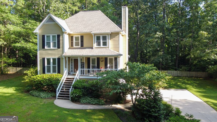 Welcome Home to Timeless Charm and Everyday Comfort. Tucked away on a full acre in a peaceful, non-HOA community of Paulding County, this traditional home with a Cape Cod flair offers more than just a place to live. It offers a lifestyle. With its classic character, thoughtful upgrades, and inviting layout, it's the kind of home that feels warm and welcoming from the moment you step onto the front porch. Inside, you'll find three spacious bedrooms and two and a half bathrooms perfectly laid out for privacy and convenience. A sun-drenched sunroom with its custom chandelier that creates the ideal nook for relaxing mornings or indoor greenery. The dining room also features standout lighting that adds personality to every mealtime moment. Step outside to your backyard retreat, completely fenced for pets or play, with a large deck for entertaining, a barn-style storage building, and space that once held backyard movie nights and cozy fall bonfires. This yard wasn't just maintained, it was lived in and loved. The location hits the sweet spot.. just minutes from Dallas, Hiram, Powder Springs, Douglasville, and Villa Rica. Enjoy quick access to shopping, friendly neighbors who look out for one another, and a neighborhood where privacy meets community. Notable improvements include a newer roof and updated hardwood floors, blending peace of mind with lasting value. Note: the seller is an inactive licensed real estate agent, is offering a $10,000 concession toward your closing costs and an additional $10,000 renovation allowance so you can make this house your own. Don't miss your chance to own this rare combination of space, character, and location. Schedule your showing today and imagine your life here.