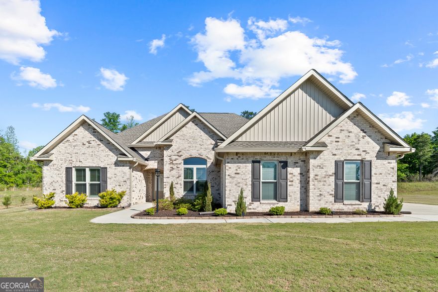 Welcome to your dream home! All brick one level home built (2021) with lots of upgrades. This country living delivers a breath of fresh air on over half an acre while conveniently accessible to interstate. Once you enter this stunning well kept home, notice the high 12 ft. coffered ceilings, open floor plan with water proof plank flooring through out home, fireplace and separate dining room. Beautiful kitchen offers granite countertops, matching stainless steel appliances with upgraded convection oven, farm style sink, island with bar, eat-in kitchen area. This 4 bedrooms & 2.5 bathrooms has a split floor plan with large guest bathroom with double sinks and separate shower/tub area. The master bedroom is spacious with a spa like en-suite garden tub, double vanity with two large upgraded mirrors, tile shower with glass door and a walk-in closet. Screened porch with flat screen TV for relaxing and entertaining outdoors. Additional added features include; extra sod added to the backyard with sprinkler system, full gutters, plantation shutters, extra insulation, and a soft water system and so much more! Don't miss out on this amazing home!