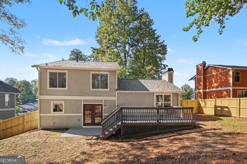 Photo of 5409 Biffle Downs Road, Stone Mountain, GA 30088 (MLS # 10872932)