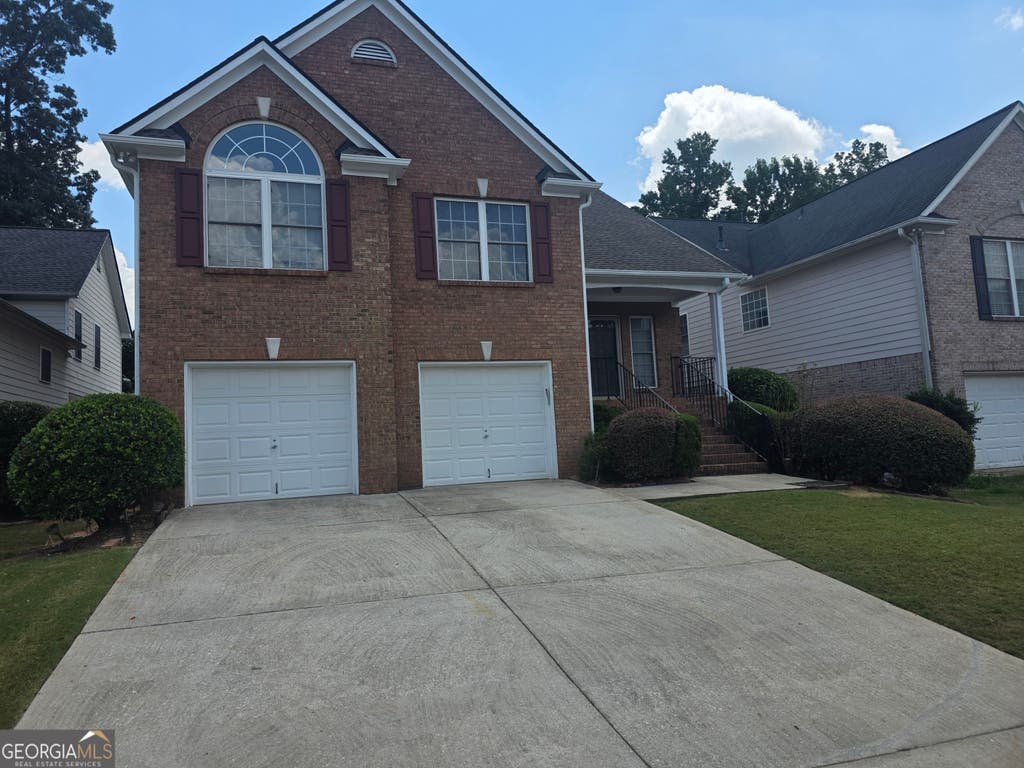 Photo of 4550 Parkview Walk Drive, Lilburn, GA 30047 (MLS # 10810956)