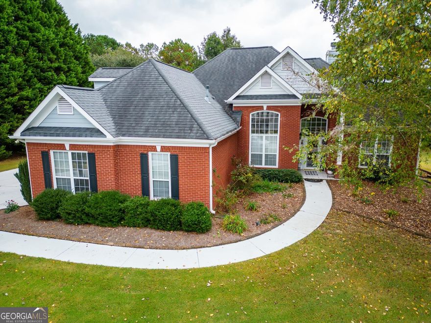 Beautiful ranch home in a great community in the Grayson HS district with attached 2 car garage AND detached 16' x 28' garage/ workshop.  Come home to this 4 bedroom, 3.5 bath home with high ceilings, and a beautiful screened in porch! The lot is a spacious 1.5 acres, one of the largest in the neighborhood.  LVP flooring can be found throughout the living spaces and master, with tile in the bathrooms and laundry room.  The community has swim, tennis, a playground, a clubhouse, and a fishing pond!