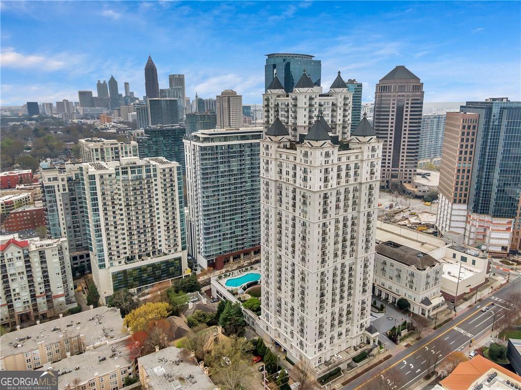 Immaculately renovated 1 bedroom 1 bath in the heart of Midtown Atlanta. This unit comes with 1 parking space but you wont need it with all that is nearby! A view that glides along the tree tops will have you feeling miles away from the center of it all. Renovated Kitchen, floors, and bathroom, in unit washer and dryer provide more than expected at this price point. Building features a 24 hr concierge, dog park, dog spa, FREE high speed internet in unit and all common areas, gym, English garden and soon to be completed outdoor kitchen lounge and grill space, Free indoor bike storage. The amount of restaurants within 1/2 a mile are too many to mention. Atlanta's newest food hall, Politian Row across the street. Piedmont Park so close it could be considered your backyard! Half mile to Whole foods, less than 1 mile to Trader Joe's, Kroger, and Publix.