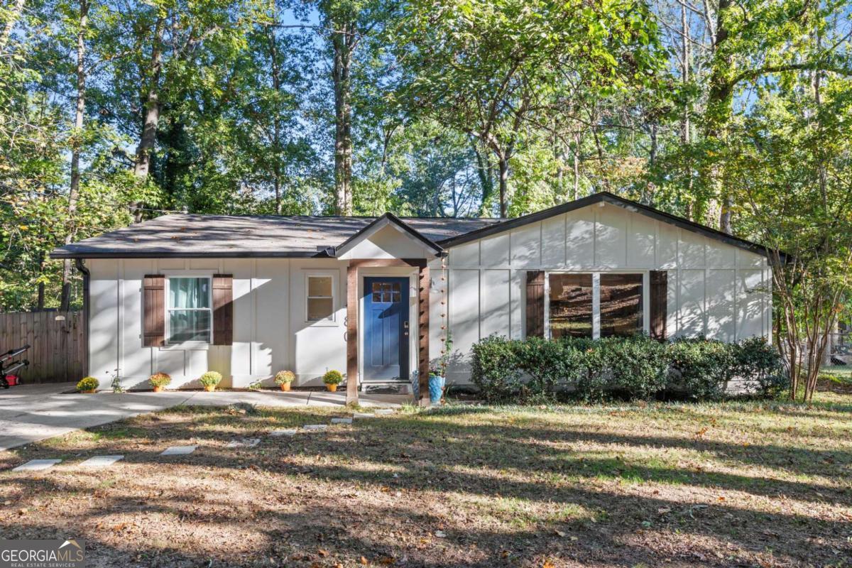 CHARMING 3/2 Bungalow in an unbeatable location! In addition to be located on Lake Lanier, Eagle Creek Shores is just 5 minutes from South Forsyth/Cumming's most desirable shopping, dining and entertainment venues! Renovations/updates make the most of each square foot, featuring open main living/kitchen/dining area with soaring cathedral ceiling. Outstanding outdoor living is inviting on the spacious deck and the large fenced backyard.