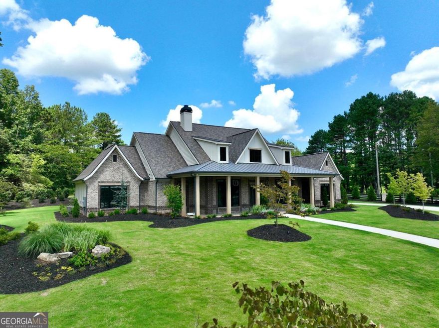 Use 250 Old Jones Rd. Alpharetta, Ga. 30004 for GPS. This stunning Craftsman-style home offers luxury living in Alpharetta's sought-after Cherokee County. Boasting exquisite brick construction on four sides, this home exudes elegance and charm. Nestled in Alpharetta, Georgia, this property offers the perfect blend of suburban tranquility and urban convenience. Enjoy easy access to top-rated schools, parks, shopping centers, and dining options. Experience culinary excellence with top-of-the-line appliances. Elevate your living space with locally crafted custom cabinets. Enjoy the timeless beauty and durability of stain in place hardwood flooring throughout the home. Featuring exquisite concrete countertops with built-in sinks. Entertain in style with a fully equipped outdoor kitchen featuring Wolf and Sub Zero appliances. Relax in the shade of the covered patio, adorned with elegant herringbone brick detailing. Prepare to be amazed by the meticulously designed master closet, perfect for the discerning client. From intricate trim work to designer fixtures, this home is filled with upscale details that set it apart from the rest. Prewired EV garage outlet. Our roofing materials are made with F Wave premium synthetic roof shingles and offer a lifetime warranty. They are made to with withstand 130 mph winds, Class 4 Hail, and Class A fire protection. Our Casement windows offer you a 10 year warranty (20 year glass warranty). Seamlessly control your lighting, climate control, surround sound, and Lutron window shades from your phone. With too many upgrades to mention, this home offers luxury living at its finest. In addition to the main living and bonus square footage, this home includes an additional 2411 square feet (front and rear porch plus garage) for a total of 6434 square feet (under roof and all other areas). Showings scheduled upon receipt of Proof of Funds (POF) or PreQual Letter. Listing agent will be present for all showings. Floor plan shown has altered square footage. Security Camera's in Use.