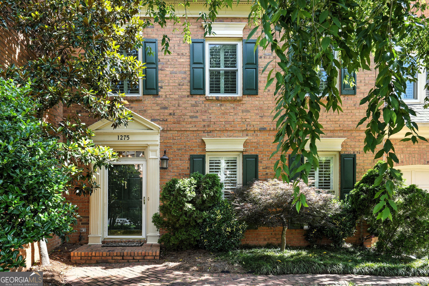 Welcome to this stunning updated, all-brick townhome in the highly sought-after Fairfield Subdivision in Dunwoody! Boasting over 3000 sq ft of elegant living space, this 4-bedroom, 3.5-bath home is the perfect blend of luxury, comfort, and convenience. Step inside to find new interior paint from top to bottom and gorgeous hardwood floors throughout the main level. The kitchen has new white countertops, backsplash, and brand-new stainless-steel appliances-perfect for entertaining or everyday living. The spacious primary suite is a true retreat, featuring a vaulted ceiling, gas fireplace, walk-in closet, and an updated bathroom with a walk-in shower. Enjoy seamless indoor-outdoor living with a huge entertaining deck overlooking a beautifully landscaped, fenced backyard featuring low-maintenance artificial turf. The RainAway under-deck system with built-in fans and lighting creates a cozy, covered patio space, while the epoxy-coated patio and garage floors add a sleek, durable finish. Retreat to the large, finished basement, ideal for a guest suite, home office, or gym, complete with a full bedroom and bathroom. Additional upgrades include new Pella windows, custom plantation shutters, modern lighting fixtures, a new hot water heater and a bonus walk-up attic space-perfect for all your storage needs. With a 2-car garage, ample storage, and a prime location close to shopping, dining, parks, and top-rated schools, this home truly has it all. Don't miss your chance to own this exceptional property!