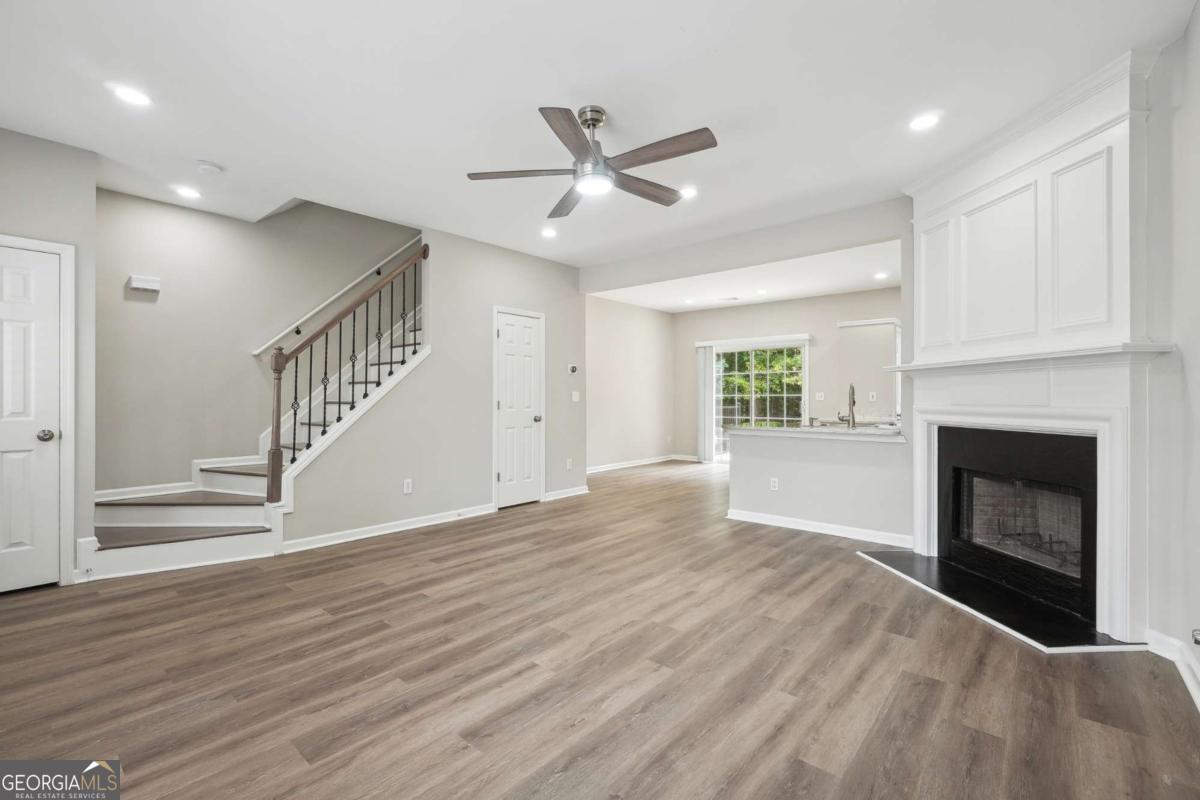 Fully Renovated townhouse, its hard to find in Johns Creek. All Brand NEW kitchen appliances, Brand NEW Washer and Dryer. The entire kitchen is renovated and has quartz counter top, kitchen has exhaust outlet vent and huge kitchen sink. Entire house has Luxury Vinyl plank flooring, NO Carpet, Popcorn ceiling is removed and it has a nice plain ceiling. Entire house has White LED Recessed Daylight. Extended cement backyard patio with railings. Entire house has Brand new 2.5 inch wide blinds for more natural lights. TOP RATED Schools in Georgia. Wooded stairs and upgraded metal staircase railings. Living room and both master bedrooms comes with brand new fans with LED light and remote control. 2 large master bedrooms and 2.5 bath town-home in sought after Johns Creek school district. Walking distance to Kroger, Aldi, multiple restaurants nearby, Town-home has plenty of natural light. Large family room with a gas fireplace and open floor plan. The subdivision is just minutes away to many amenities including grocery stores, restaurants, Avalon, and great schools. Private backyard. Top blue ribbon schools. Rent includes water, trash and front lawn maintenance. 2 dedicated parking spaces. No smoking allowed. Minimum credit score of 650. Hurry this house will rent fast.