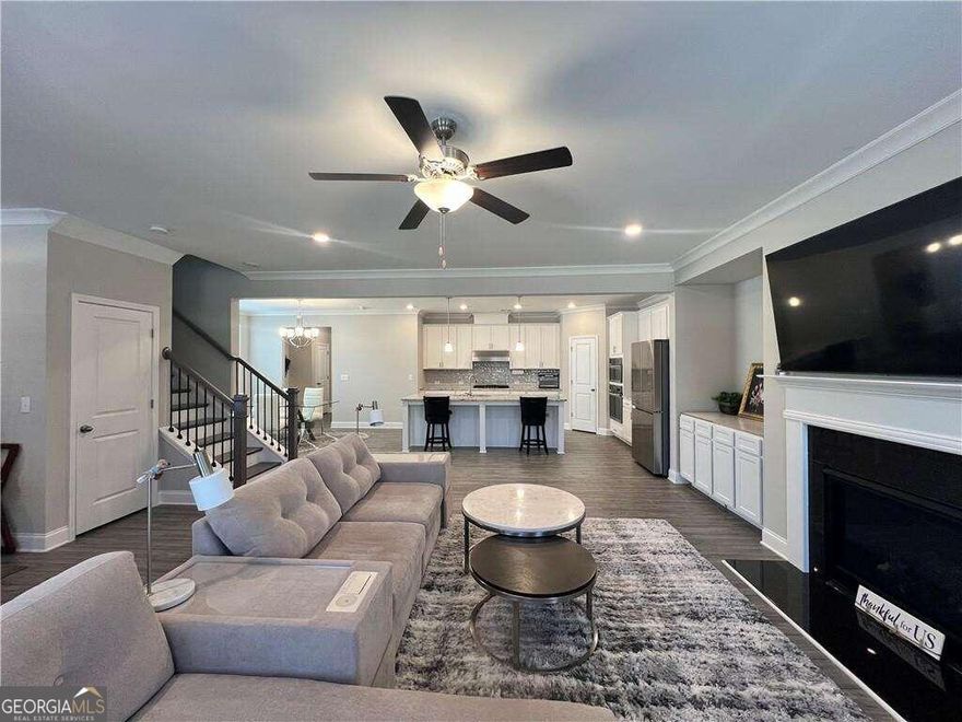 Welcome to modern luxury living in Johns Creek, GA, with this stunning single-family residence, constructed just 1 year ago. Boasting 4 bedrooms and 3.5 bathrooms, this home offers contemporary comfort and style. As you step inside, you're greeted by an open and spacious floor plan, featuring high ceilings, gleaming hardwood floors, and an abundance of natural light. The gourmet kitchen is a chef's dream, equipped with state-of-the-art appliances, granite countertops, and custom cabinetry. The master suite is a serene retreat, complete with a luxurious en-suite bathroom and a walk-in closet. Additional bedrooms offer versatility for guests, a home office, or a personal gym. Located in the desirable community of Johns Creek, this home offers convenient access to top-rated schools, parks, shopping, dining, and entertainment options. Outside, the professionally landscaped yard provides a tranquil backdrop for outdoor enjoyment and relaxation. And the best part? Lawn care is included, ensuring a beautifully maintained yard without the hassle.