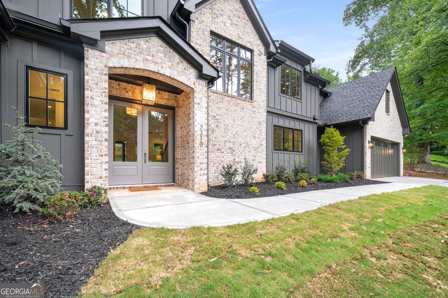 Luxury new construction dream home in Wheeler District- highly regarded for its STEM Magnet program. PRIME location- just minutes from freeway access! Inside, you'll be greeted with elegance and thoughful design. Primary on main PLUS an additional "2nd primary suite" on main. Upstairs bonus room can be used as a 5th bedroom.The living room features a sophisticated plaster fireplace. You will notice high-end fixtures throughtout the home. The kitchen impresses with an abundance of cabinetry, gas range, and a plaster range hood- integrating the living room and kitchen design. Sparkling tile in the kitchen sorrounds the wood framed windows and elevates the tree-line views above the kitchen sink. Walk in pantry provides a dedicated space for small appliances, keeping countertops clear for an organized home. The peaceful backyard is the star of the home here- two covered back porches with a cozy brick fireplace for these upcoming relaxing fall evenings. Flat fully fenced backyard with mature trees for shade. Hookups on the patio give options for an outdoor kitchen. The main level offers a tranquil primary suite, complete with a spa-inspired soaking tub and shower. The "second primary" on the main level features a stand up shower and walk in closet- offering comfort and accessability for your guests. Upstairs, each bedroom has a walk in closet, and connects to its own private bathroom with a stand up shower with high-end tile. Down the hall, you'll come upon a stylish sitting area and an expansive bonus room- providing flexible space for a media lounge, home office, or use it as an additional bedroom. This home is equipped with a tankless water heater, front and back irrigation, and a deep garage designed to accommodate 4 vehicles or provide bonus workshop space. Nearby private schools- Mt Bethel and Eastside Christian schools are only a mile away, adding to the home's exceptional conveniece. Schedule a showing today! This home is completed and ready to be yours.