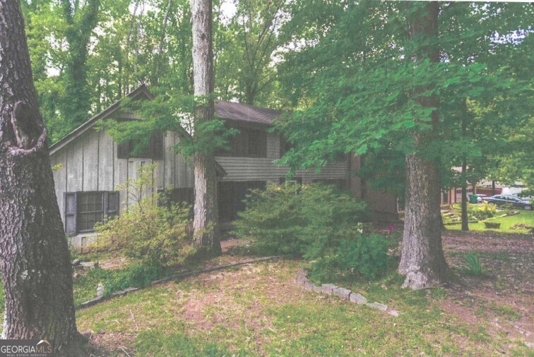 Large 5 bdroom 3 and 1/2 bath three story home with finished basement. Master has additional sitting room. Basement has a fireplace, wet bar, bedroom, and full bath. Formal living room/office on main. Formal dining room flows into kitchen with double ovens. Secondary bedrooms are large which make them perfect for a growing family. Deck overlooking large private backyard. Shown by appointment only use Showing Time. on Supra Lockbox