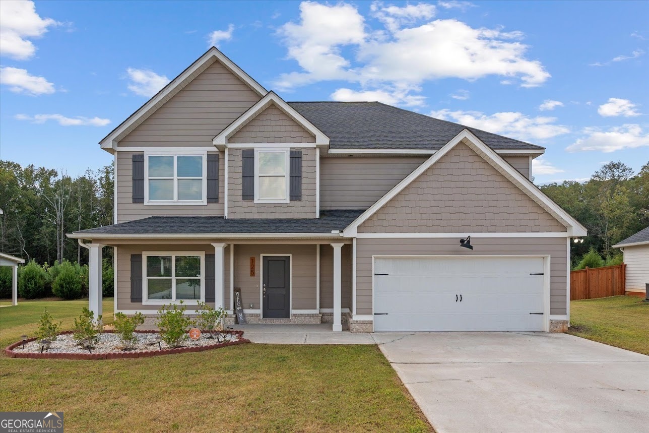 Built in 2022, this stunning 4-bedroom, 2.5-bath home is tucked inside the highly sought-after North Point Grand subdivision. From the moment you walk in, you'll be greeted with bright, open living spaces designed for both comfort and style. The main level features a separate dining room perfect for entertaining, a spacious family room that flows seamlessly into the kitchen, and modern finishes throughout, including granite countertops, 2 pantries, an oversized island, and stainless steel appliances. Step outside to your covered back porch, an ideal spot for morning coffee or evening relaxation. Upstairs, the spacious owner's suite offers a private retreat complete with a large bathroom and dual closets, while three additional bedrooms provide flexibility for family, guests, or a home office. Living in Northpoint Grand means more than just a home; it's a lifestyle. The community offers a pool, clubhouse, playground, and sidewalks, fostering a true neighborhood feel. With Carrollton City Schools, shopping, dining, and local parks just minutes away, this home truly checks every box for today's buyer.