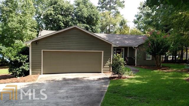 Great 3BD/2BA lake home on a very level lot with 170 ft. of water frontage and 12 ft. of water depth. Double boathouse, max dock with lights and big amazing views. Well decorated interior that has many recent upgrades including hardwood flooring throughout. Completely remodeled kitchen with granite counter tops, double oven and stainless appliances. Large 2 car garage with separate sink and ice-maker. Don't forget the storage building. This home is waiting on you on main water in Baldwin County.