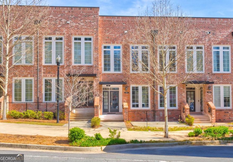 Experience the perfect blend of modern elegance and urban convenience in this stunning  condominium at The Maxwell, AlpharettaCOs premier walkable community. Designed for  effortless luxury, this residence boasts a bright, open-concept layout with soaring 10-foot  ceilings, sleek new vinyl plank flooring, and designer lighting. Floor-to-ceiling windows flood the  space with natural light, creating an inviting atmosphere.  The gourmet kitchen is a chefCOs dream, featuring crisp white shaker cabinetry with soft close  doors, an oversized quartz island, premium stainless steel appliances and ample storage.  Overlooking the spacious living and dining areas, this seamless design extends to a spacious  private covered balconyCoideal for enjoying morning coffee or evening cocktails.  The primary suite is a tranquil retreat, offering a spa-like bathroom with marble floors, Quartz  vanity with undermount sink, an oversized walk-in shower, and a custom walk-in closet. A  separate den provides valuable flexibilityCoperfect as a home office, guest space, or even a  second bedroom. A stylish half-bath and a dedicated laundry space complete the main level.  This unit also includes a private one-car garage with an additional driveway space.  Situated just steps from The MaxwellCOs top-tier amenitiesCoincluding a pool and cabana, bocce  ball, fire pits, and grilling stationsCothis home offers an unparalleled lifestyle. Enjoy direct  access to the Alpha Loop, a pocket park, and the best of Downtown Alpharetta, including  Fairway Social, award-winning dining, and boutique shopping. With Avalon, Wills Park and GA  400 just a mile away, this is the ultimate opportunity to own in one of AlpharettaCOs most  coveted communities!