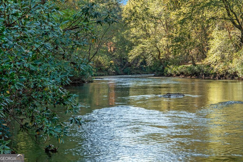 Chattahoochee River Front Lot. Can be combine with additional 2+ acres to add additional 200+ river frontage. River Forest Run is a private neighborhood located on an active deep water section of the Chattahoochee. Enjoy paddle sports and pick your river section for a relaxing float or exciting Kayak experience with some active white water sections. Put in or out right from this property. Bass and Trout fishing and enjoying the natural beauty of this rare property. Listen to the sounds of running water on this portion of the river with high river character and river runs. Property is minutes to Cleveland, Clarkesville, Helen and Sautee. Hike Mount Yonah and enjoy local wineries and brewery's surrounded by the beautiful landscape of this North Georgia gem. Agent/Owner