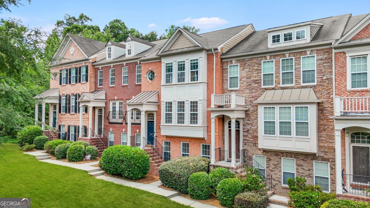 Step into effortless sophistication at 4757 Cheviot Way SE, an elegantly appointed townhome where curated upgrades, a desirable location, and a touch of luxury come together seamlessly. Tucked away in a peaceful, well-kept community just minutes from Downtown Smyrna and the vibrant energy of The Battery and Braves Stadium, this residence offers a lifestyle of comfort, connection, and style. Inside, you'll find thoughtfully updated interiors designed to impress. From the refreshed half bathroom to the beautifully renovated guest bath, every space has been elevated with tasteful finishes and a designer's eye. Natural light floods the main living areas, enhancing the home's warm, welcoming ambiance. Upstairs, the guest bedroom offers a peaceful perch overlooking the trees, with glimpses of the Atlanta skyline that become even more prominent during the winter months, a quiet reminder of the city's proximity while you relax in your private haven. Out back, the expanded deck with custom pergola invites year-round enjoyment, whether you're sipping your morning coffee, hosting friends, or simply enjoying a quiet evening outdoors. Take a stroll just down the street to access the Silver Comet Trail, or explore nearby shops, restaurants, and weekend events. With walkability, luxury touches, and access to all that Smyrna has to offer, this home truly strikes the perfect balance between retreat and convenience.