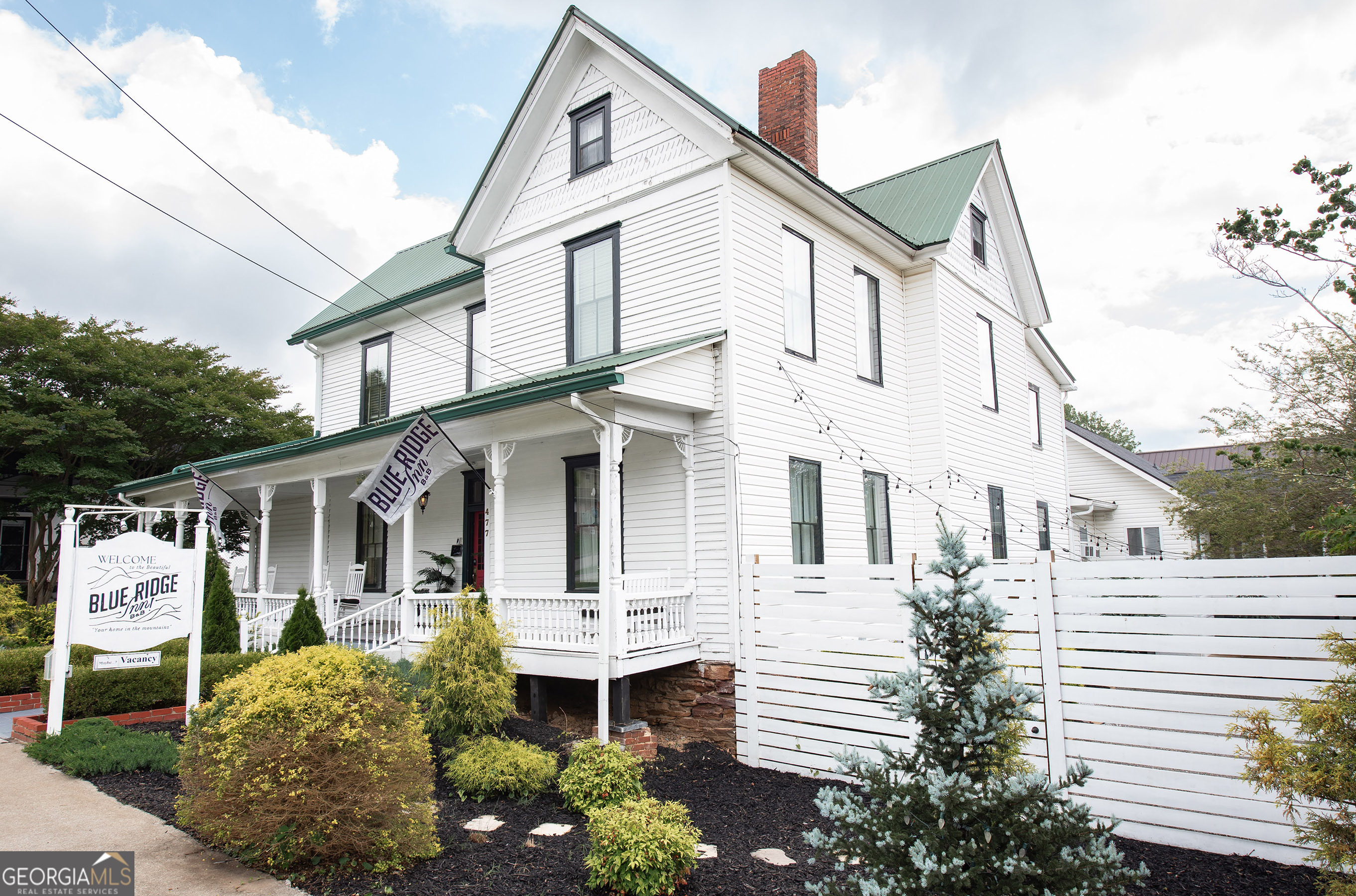 For Sale: The Iconic Blue Ridge Inn A Historic Victorian Gem in the Heart of Downtown Blue Ridge, GA. Step into the legacy of Southern charm and hospitality with the Blue Ridge Inn, one of the original homes of Blue Ridge, Georgia. Built in 1890 and meticulously preserved and renovated over the last 135 years, this stately three-story Victorian residence is now a flourishing 6,000-square-foot boutique inn - and a cornerstone of the downtown community. Perfectly positioned just steps from the Blue Ridge Scenic Railway, this elegant property places guests at the heart of it all. Restaurants, shops, bars, art galleries, and parks are all within walking distance, making this inn the most sought-after lodging option in town. The Blue Ridge Inn blends historic grace with modern comfort. It is composed of 9 total guest rooms and suites including one standout 900 sq ft "Lodge" - a private retreat complete with a full kitchen, screened porch, and side yard. Ideal as a luxury suite, or easily converted into owner's quarters, the Lodge offers versatility to match your vision. Inside, guests are welcomed by sun-drenched parlors, an upstairs library, original hand-hewn railings, and true to age old-growth Georgia hardwood floors - each detail a nod to the home's rich past. Every morning, guests enjoy a delicious Southern breakfast in the dining room, a highlight that keeps them coming back year after year. As a business, the Blue Ridge Inn is thriving. With a steadily growing revenue stream, a stellar reputation, and a robust online presence that draws guests from across the U.S., Canada, Europe, and Asia, this is more than a property - it's a destination. Guests repeatedly praise its walkable location, cozy atmosphere, charming staff, and that unforgettable breakfast. For the discerning buyer, this is a rare opportunity to own not just an architectural treasure, but a beloved and profitable turnkey business in a booming mountain town just 90 minutes north of Atlanta. The sale includes a curated inventory of antique furnishings, updated systems, and the goodwill of a deeply loyal guest base. Whether you're dreaming of running a charming bed and breakfast, seeking an established hospitality investment, or simply longing for a more meaningful lifestyle in the North Georgia mountains, the Blue Ridge Inn offers it all. Inquire today - and take the helm of a historic legacy.
