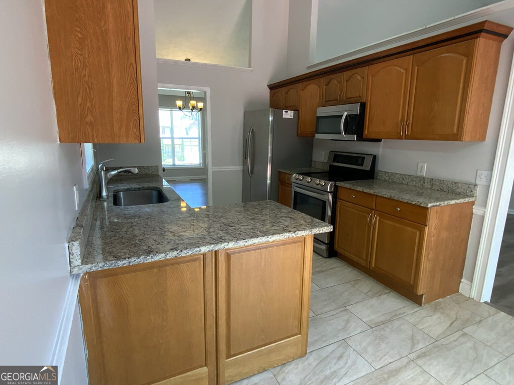Photo of 5600 Sugar Crossing Drive, Sugar Hill, GA 30518 (MLS # 10777827)