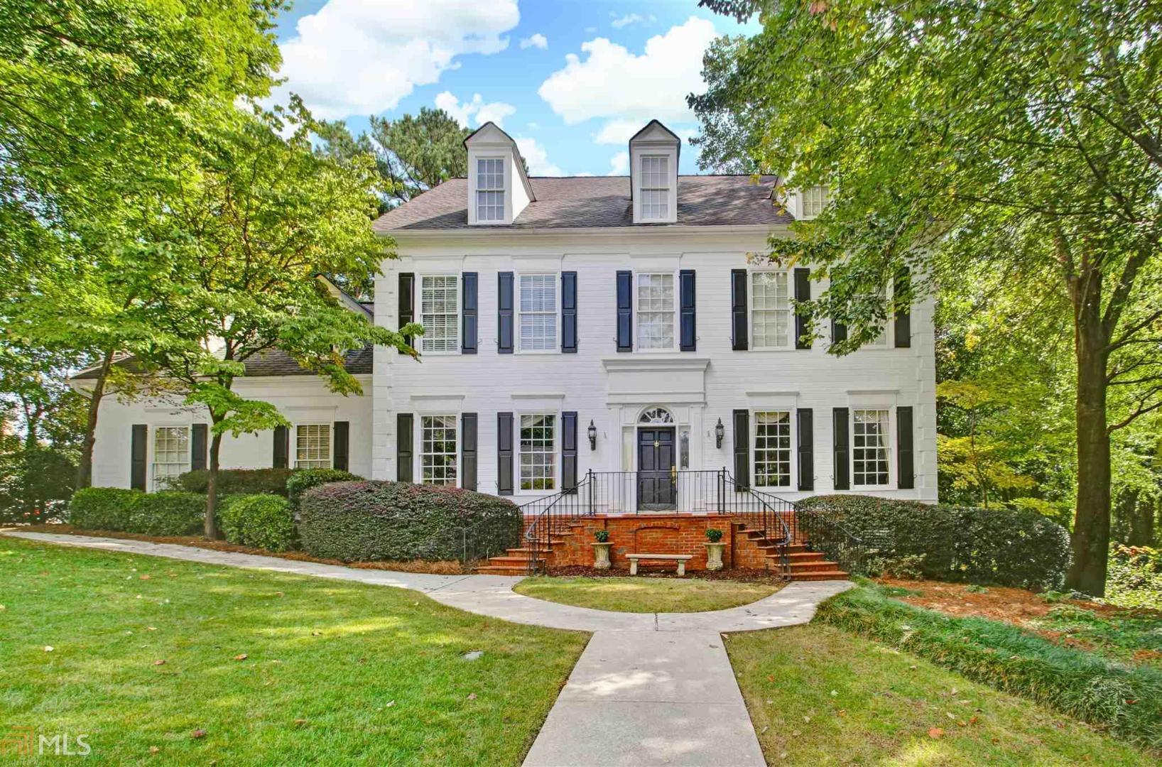 Four wonderful stories on classic Atlanta Architecture. Inlayed hardwood floors, 6 bedrooms all with private baths. backyard oasis with brick and inviting pool, mature landscaping. The Family Room and Keeping Room open to the pool area perfect for entertaining. large kitchen with upscale appliances, island and butler's pantry. Wonderful pantry with built in shelving. Huge terrace level apartment perfect for multi gen, teen suite, or "cave". prime location near Chastain, Buckhead with easy access to 400 and 285. This home is the best value of homes in the area. New construction in the neighborhood up to $4 million.