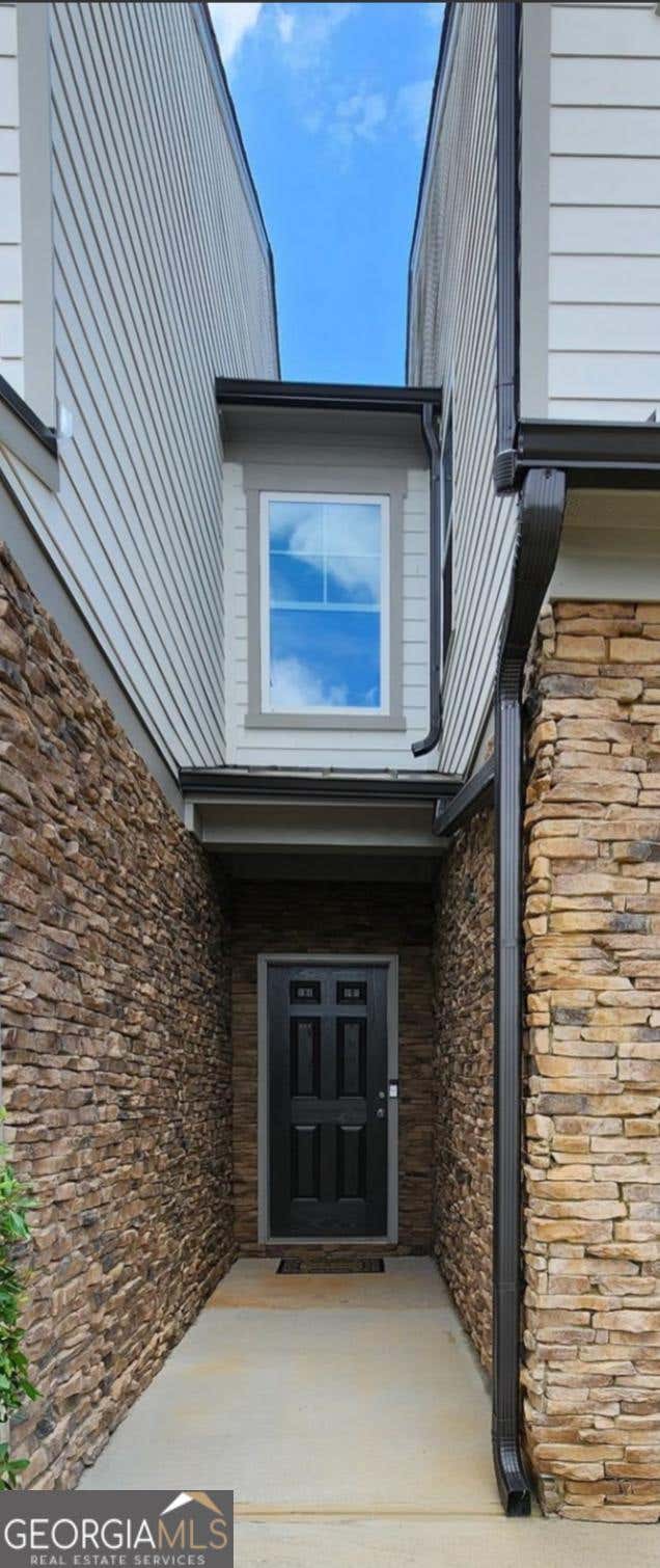 Photo of 5815 Thornton Drive, Cumming, GA 30028 (MLS # 10800674)
