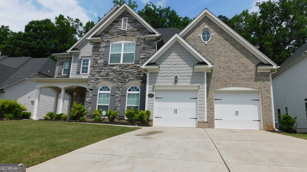 Photo of 232 Wild Rose Circle, Holly Springs, GA 30115 (MLS # 10780737)