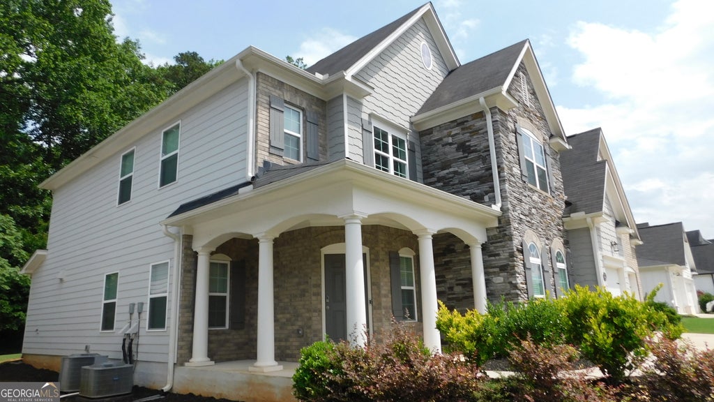 Photo of 232 Wild Rose Circle, Holly Springs, GA 30115 (MLS # 10780737)