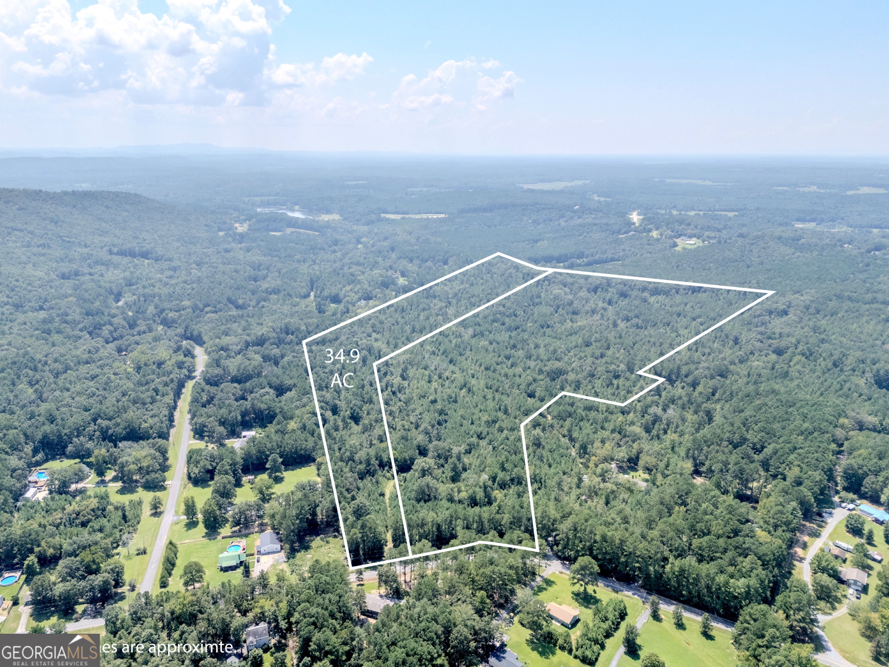 34.9 acres tucked away in a peaceful but convenient location. This property features mature hardwoods and a level topography-perfect for building your dream home. This property has access to water and power.