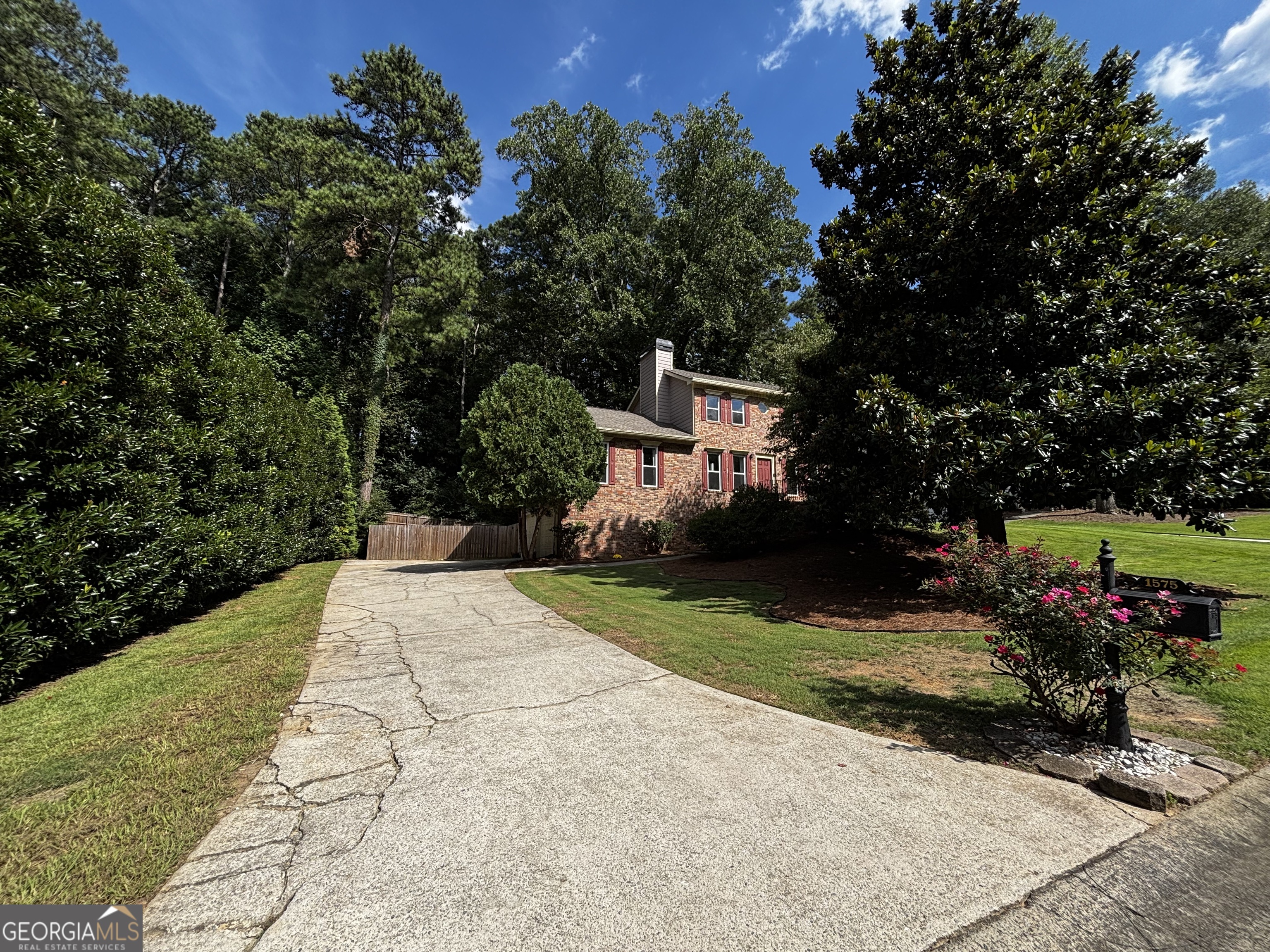 Welcome to this beautifully maintained 5-bedroom, 3-bathroom home in a quiet yet active neighborhood! Step inside to an inviting main level featuring a light-filled living room with floor-to-ceiling windows, luxury vinyl plank flooring that adds a modern touch, and a cozy fireplace. The kitchen is equipped with stainless steel appliances, a brand-new stove, and granite countertops-perfect for both everyday living and entertaining. The spacious primary suite is conveniently located on the main floor, while three additional bedrooms are upstairs. The fully finished basement offers incredible flexibility with a bonus room, full bath, and a dedicated laundry room. A two-car garage provides plenty of parking and storage space. Enjoy the outdoors with a fully fenced backyard and a private deck designed for cookouts, relaxing evenings, or hosting guests in a serene setting. Beyond the home, the neighborhood offers an abundance of amenities: a pool, tennis and pickleball courts, weekly food trucks, and community events, blending privacy with a vibrant lifestyle. This home truly combines comfort, convenience, and community. Don't miss the chance to make it your own! Seller has their real estate license.