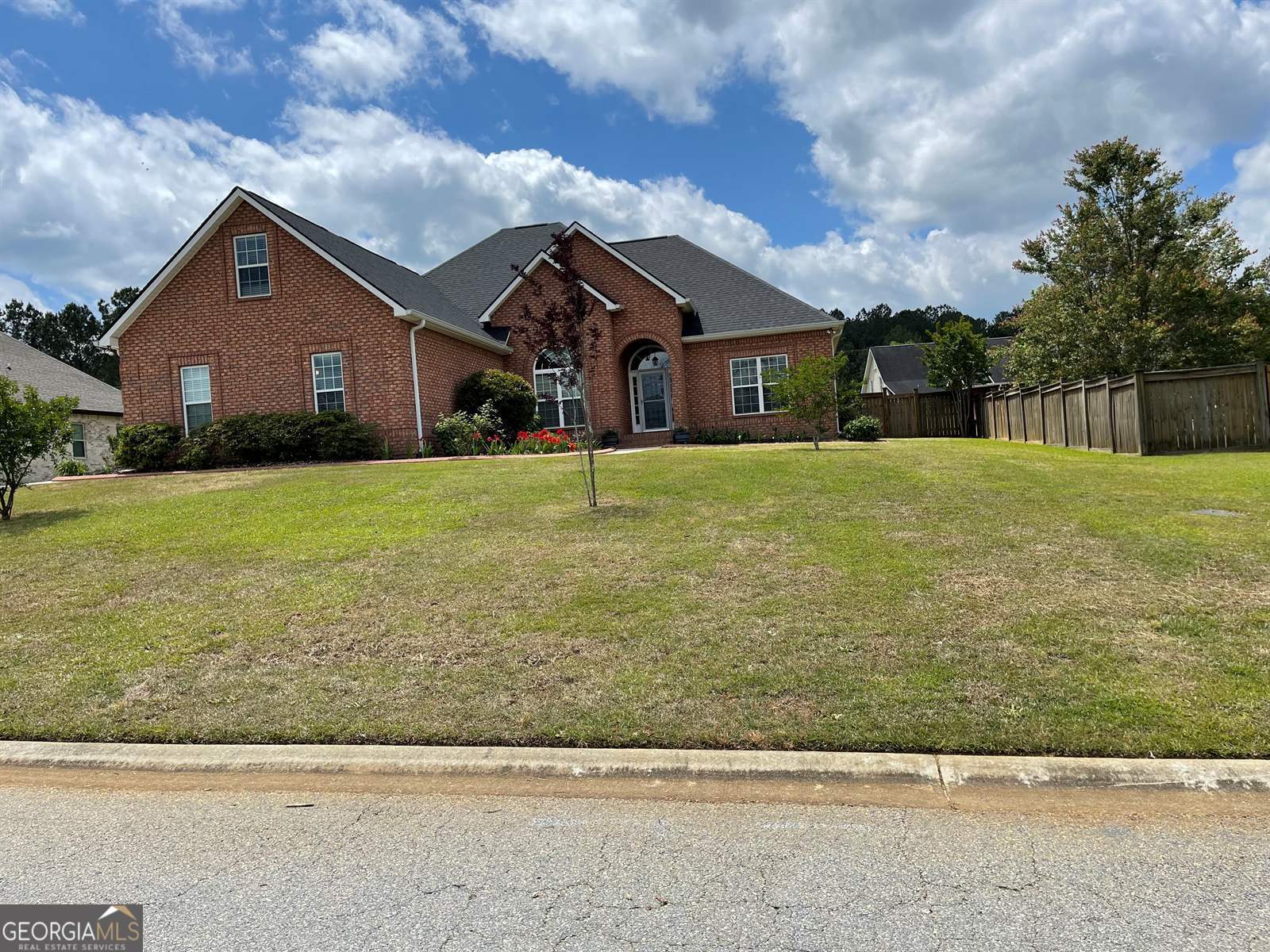 Don't miss looking at this remodeled all brick home with brand new roof. Plenty of space to enjoy inside and outside activities. Split floor plan for privacy. A full bath is located between the bedrooms. Half bath for guests. Large kitchen with plenty of granite counter space for food preparation. Remodel includes fresh paint, refinished cabinets, appliances, new luxury vinyl plank flooring through out and carpeting in the gigantic bonus room which is considered a fourth bedroom in this property description. Enjoy outside activities or relax in the 120 square foot heated and cooled sunroom not included in the total square footage watching others outside. Outbuilding included.